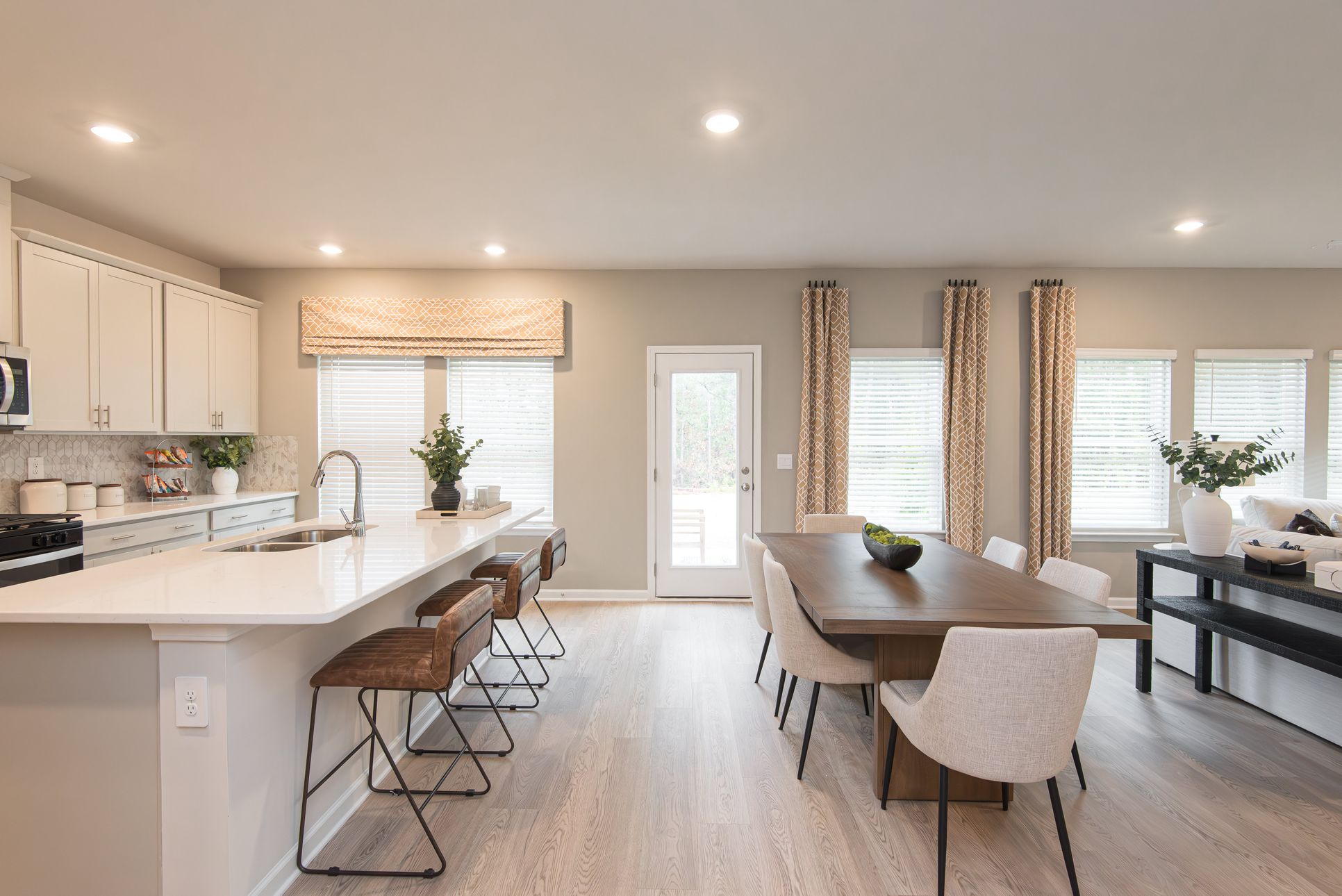Dining Room:The Dakota floorplan with the Divine Gray interior package modeled at Ivey Township.