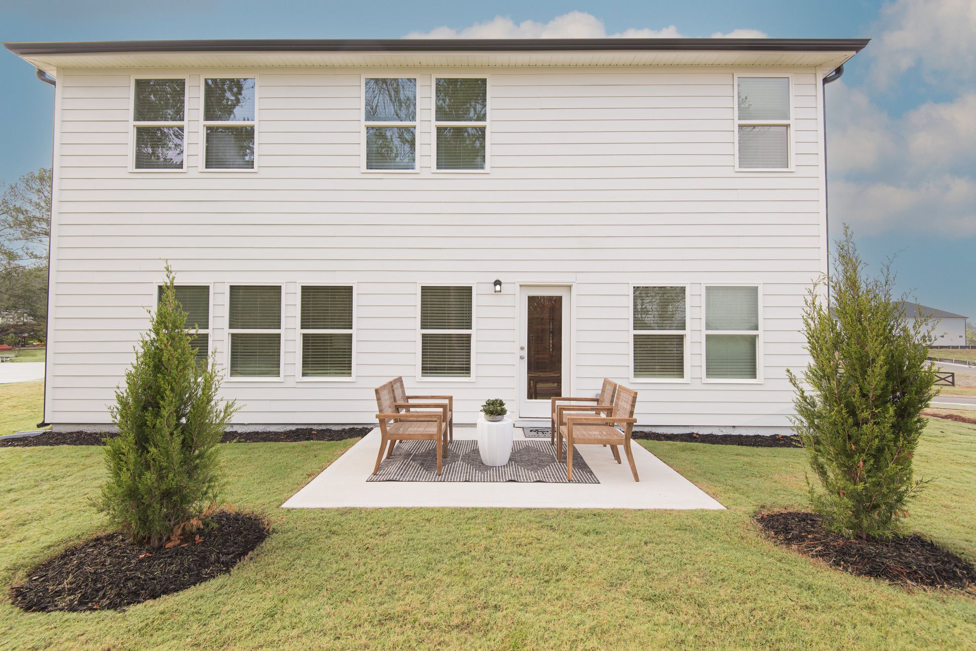 Patio:The Dakota floorplan with the Divine Gray interior package modeled at Ivey Township.