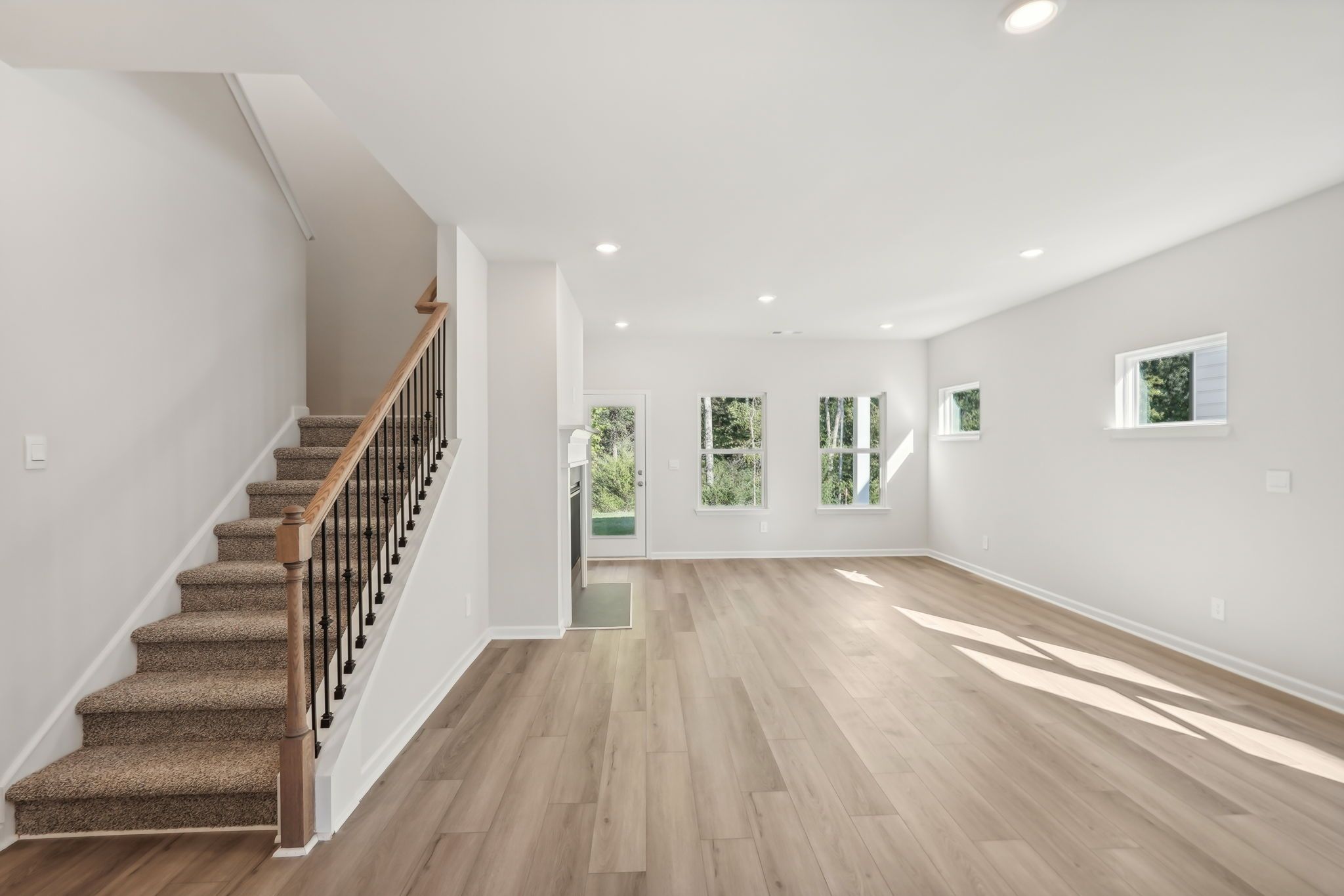 Great Room:The Manchester floorplan with the Elemental 1 interior package.