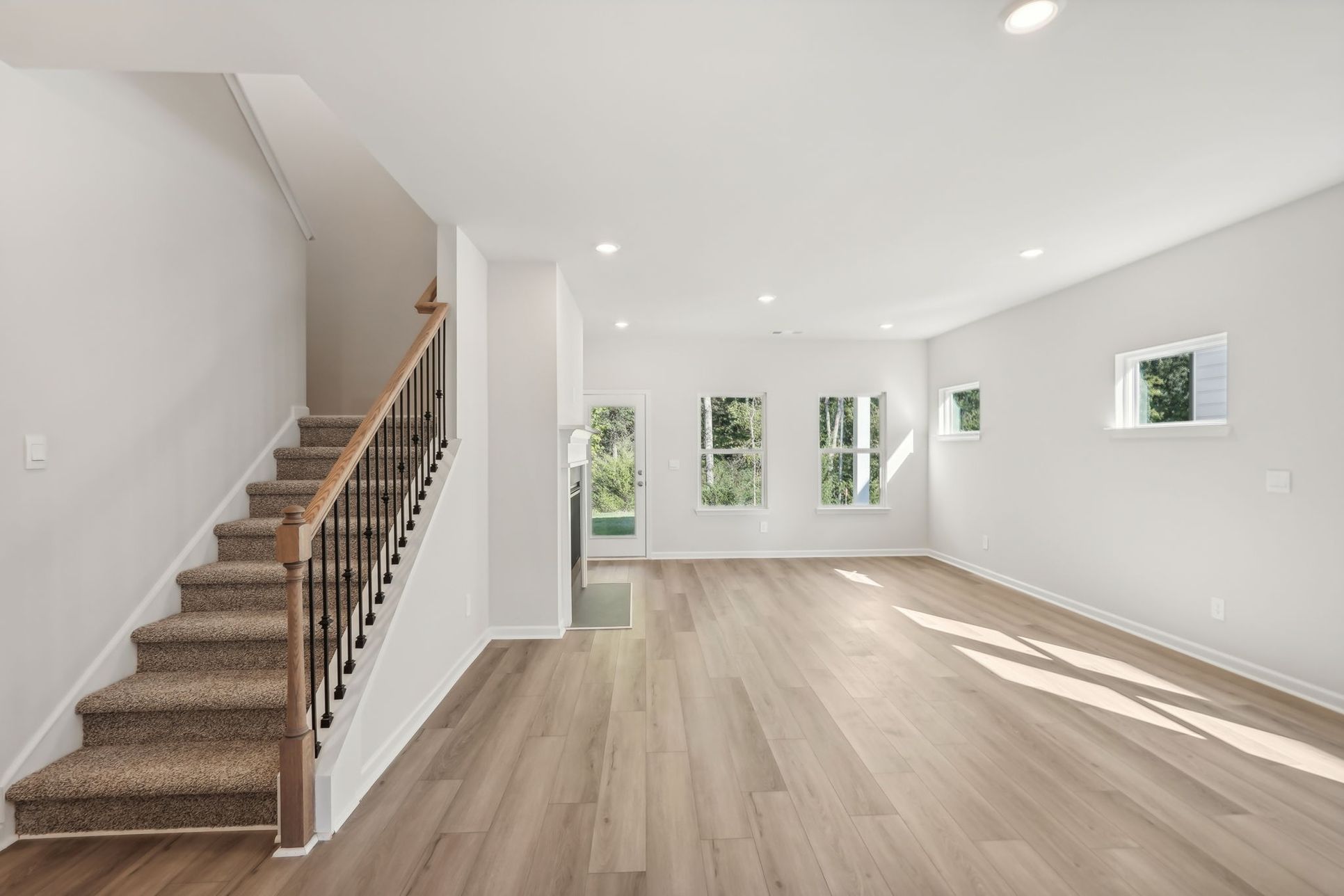 Great Room:The Manchester floorplan with the Elemental 1 interior package.