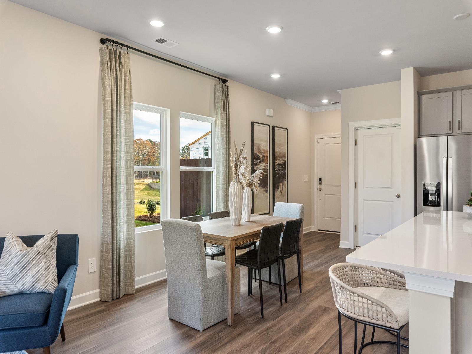 Great Room:The spacious dining area offers room for plenty of seating.