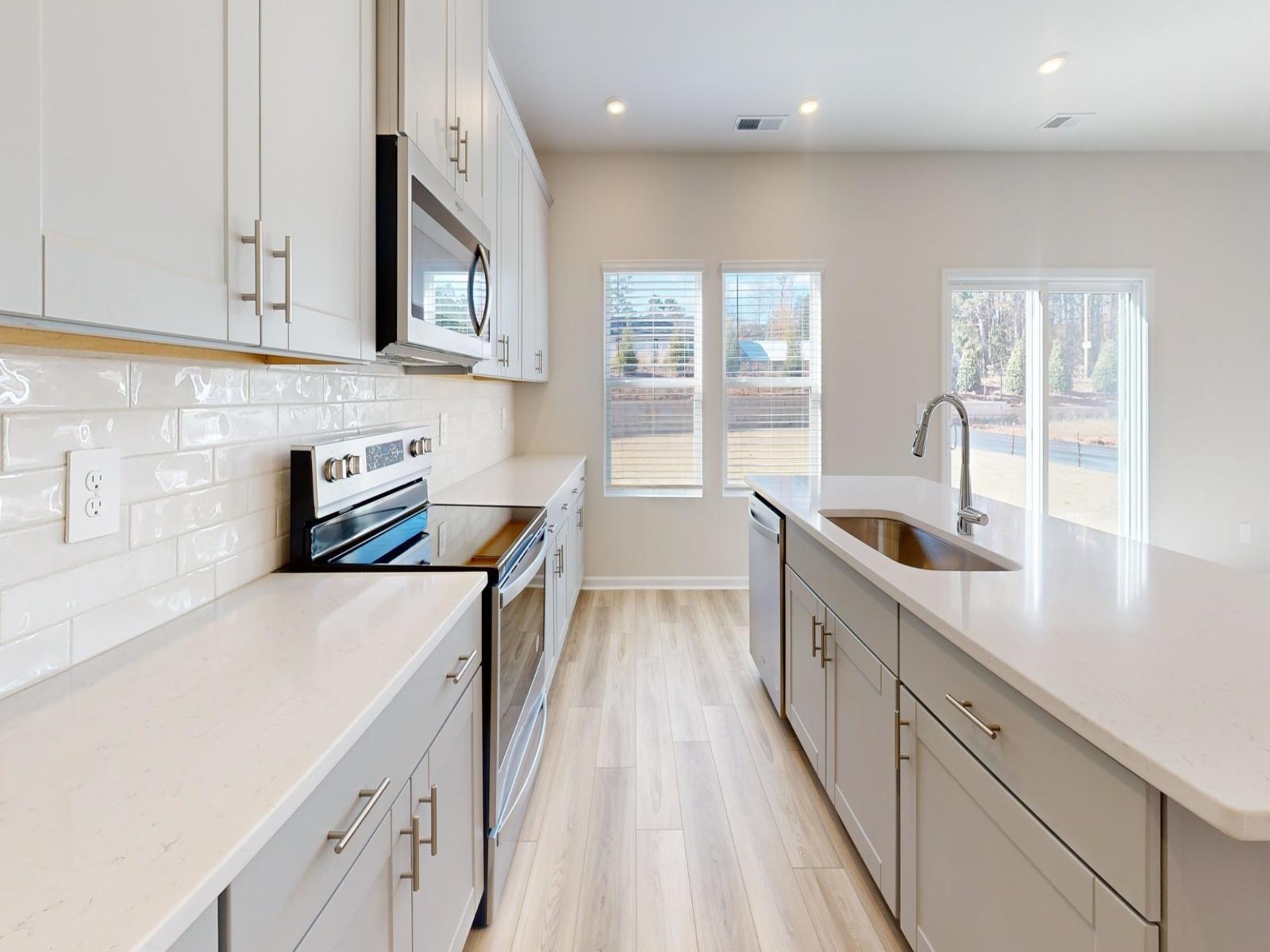 Kitchen:The sleek and functional kitchen makes meal preparing a breeze.