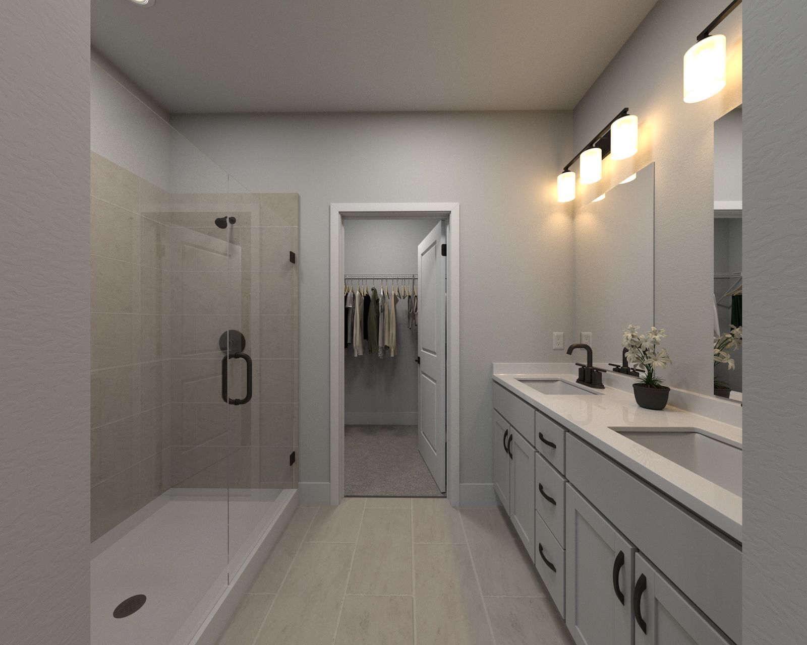 Primary Suite Bathroom:The primary bathroom offers dual vanity sinks and a walk-in closet.