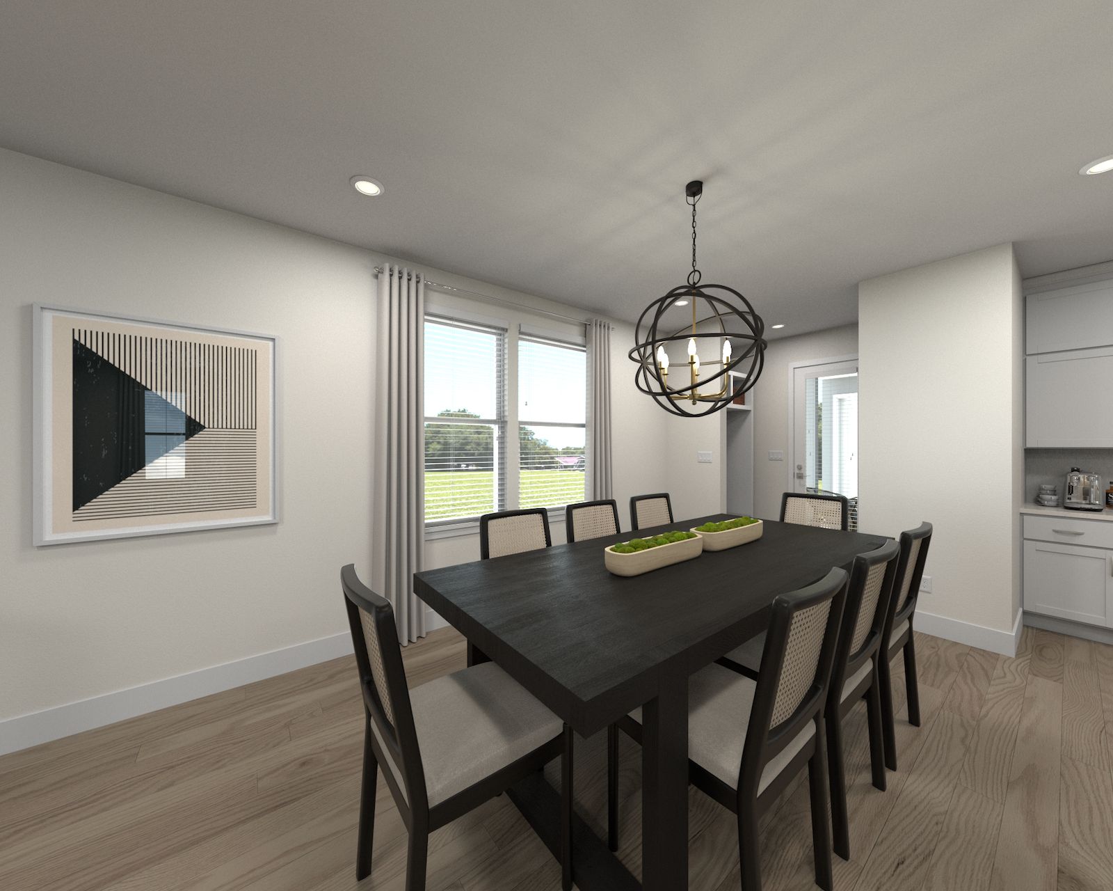 Virtually Staged Dining Room:The open-concept floorplan allows for an easy flow between the kitchen and dining areas.