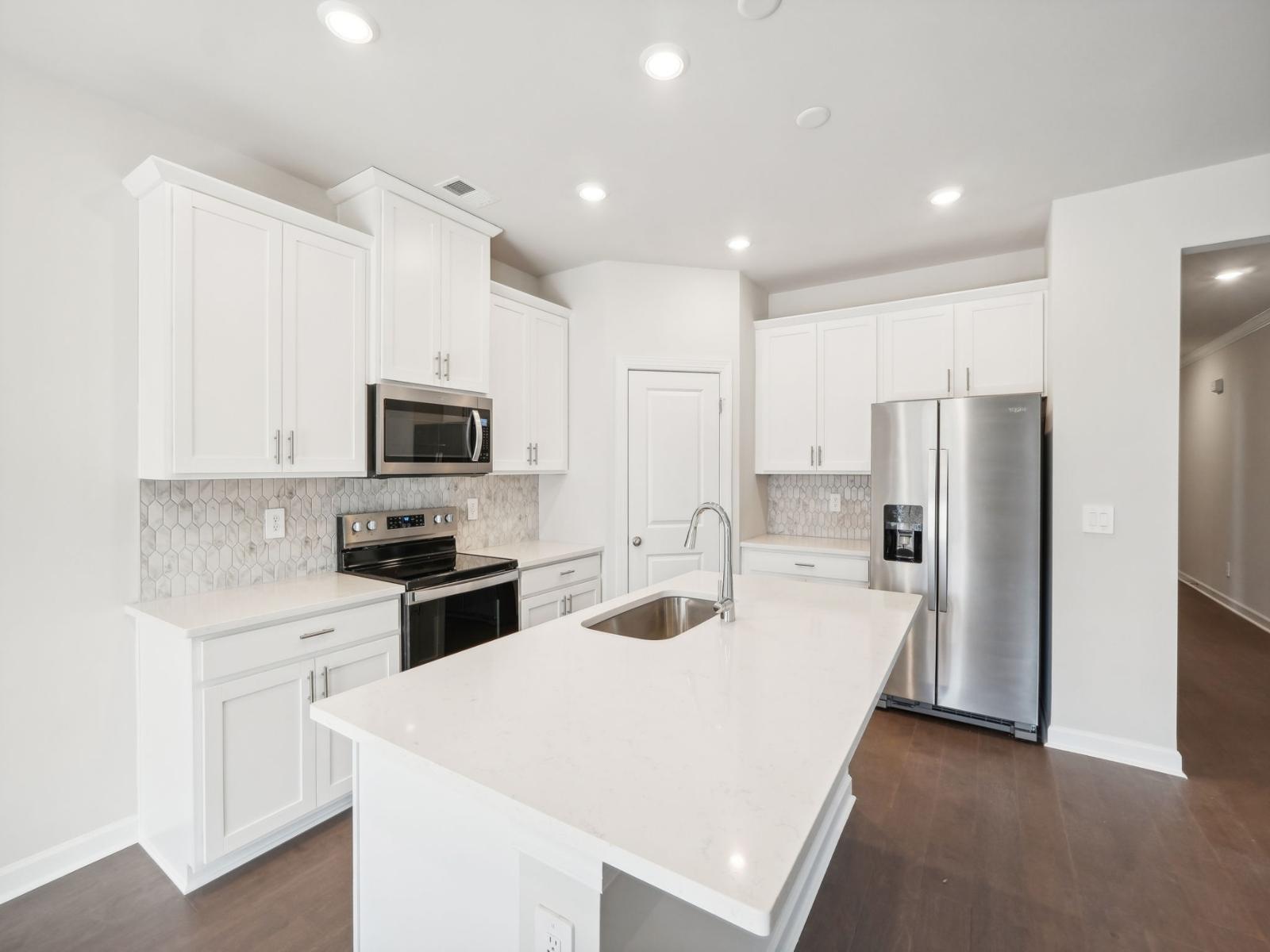 Kitchen:With plenty of cabinet storage, organizing your kitchen essentials will be a simple task.
