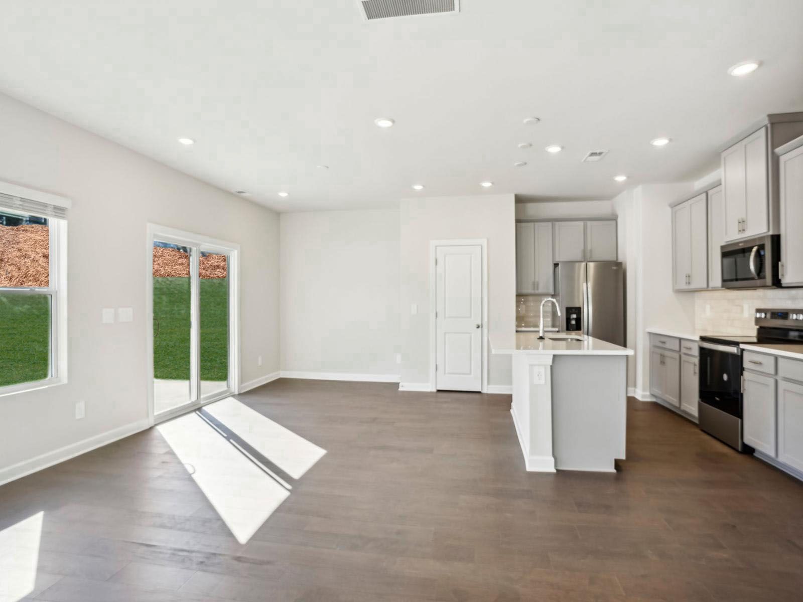 Our open-concept floorplan makes hosting and gatherings much more fun.:Our open-concept floorplan makes hosting and gatherings much more fun.