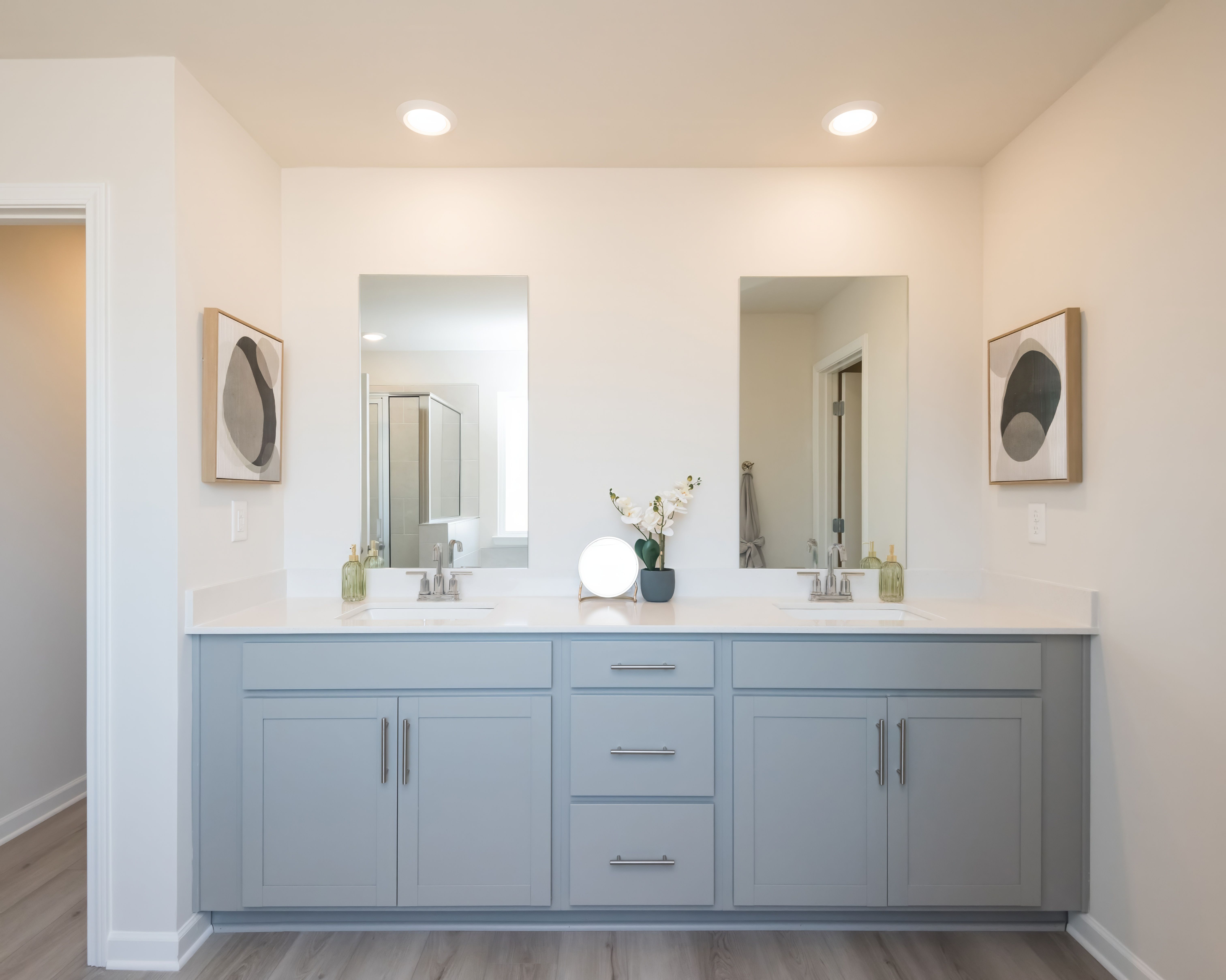 ATL_WestmontPreserve_Taylorsville_S457_F_Model_PrimaryBathroom3_3906BrushyStreet.jpg:Getting ready in the morning has never been easier with the spacious counter space.