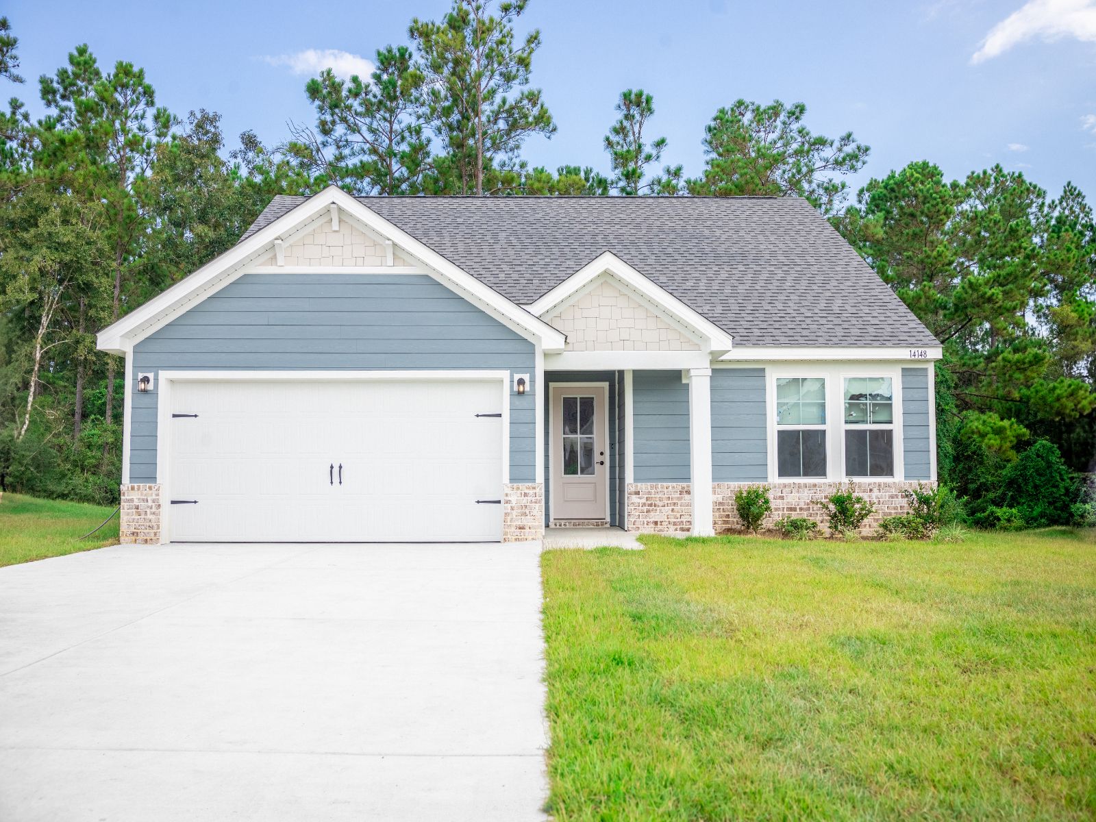 Opal front exterior at a Meritage Homes community in Gulfport, MS.
