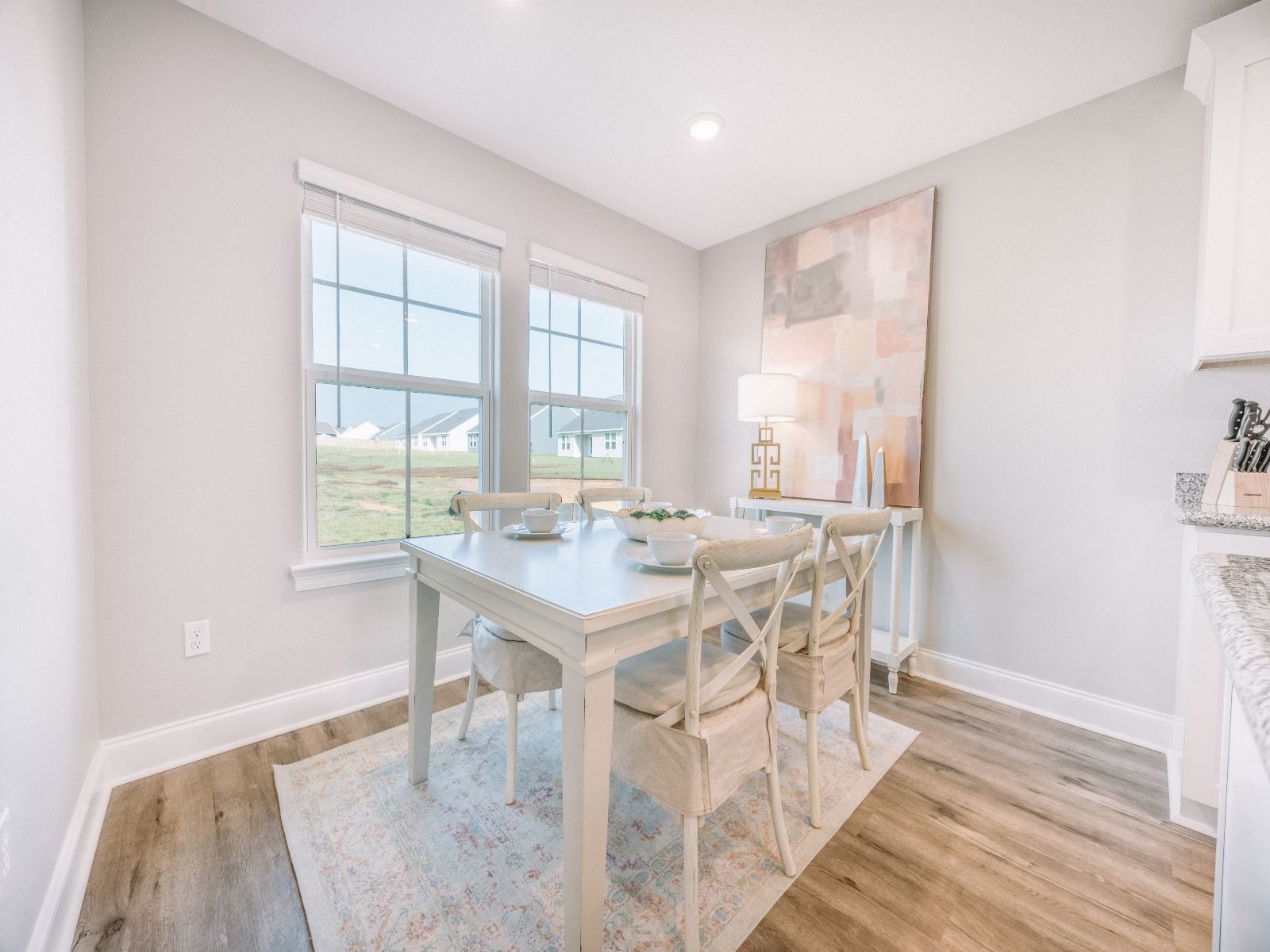 GLF_ElliottHomes_Opal_C143_Dining.jpg:Dining area in the Opal floorplan at a Meritage Homes community in Gulfport, MS.
