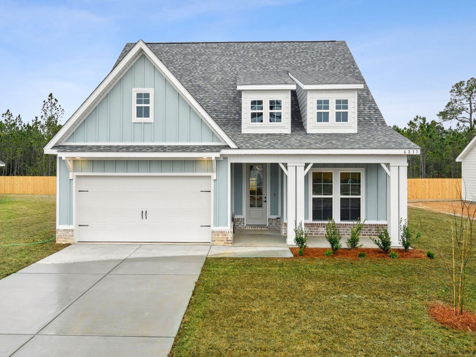 Coral front exterior at a Meritage Homes community in Gulfport, MS.
