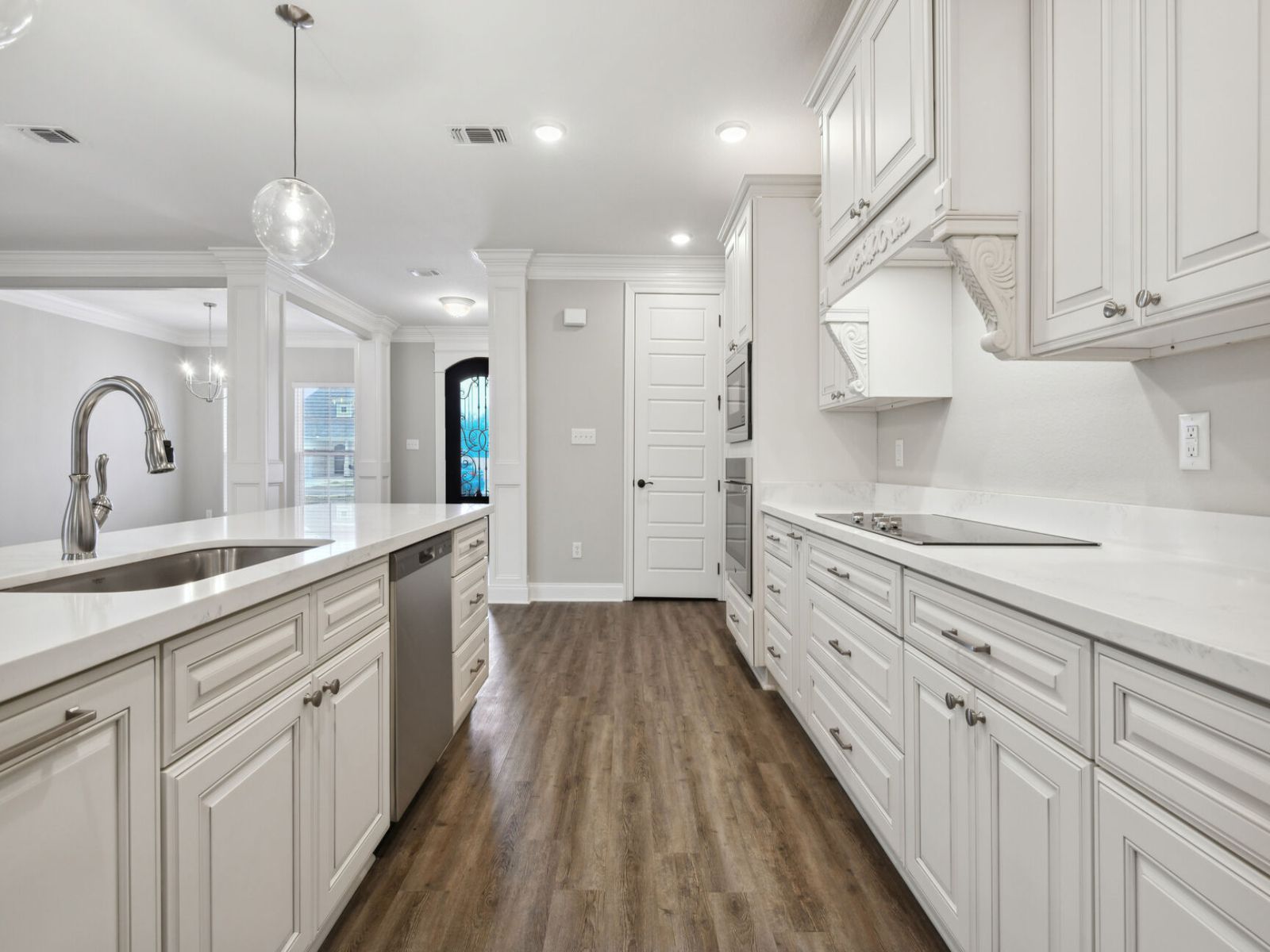 GLF_ElliottHomes_Brooks_A203_Kitchen3.jpg:Kitchen in the Brooks floorplan at a Meritage Homes community in Gulfport, MS.