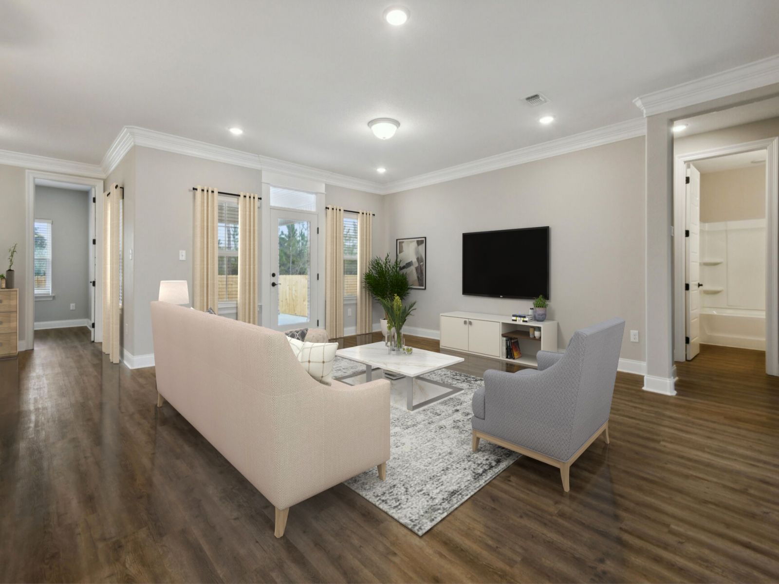 GLF_ElliottHomes_Brooks_A203_GreatRoom2VirtualStage.jpg:Great room in the Brooks floorplan at a Meritage Homes community in Gulfport, MS.