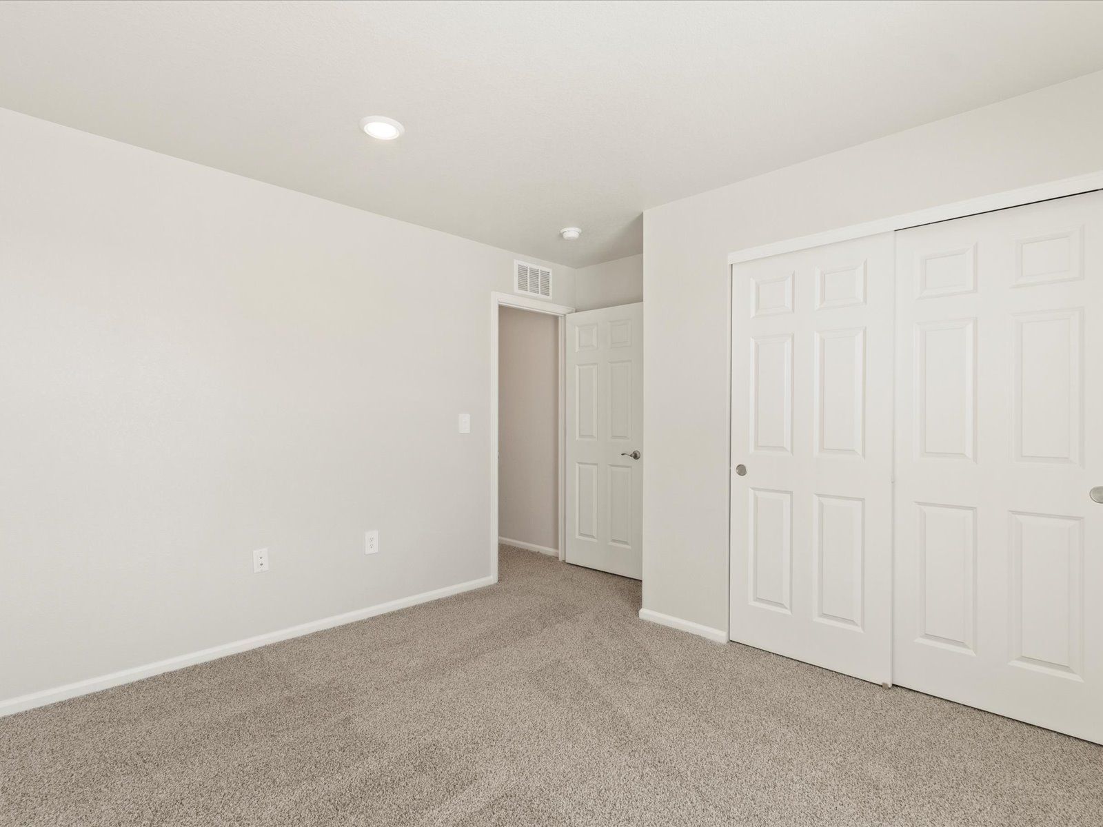 Bedroom:The Chatfield floorplan interior image taken at a Meritage Homes community in Northern Colorado.