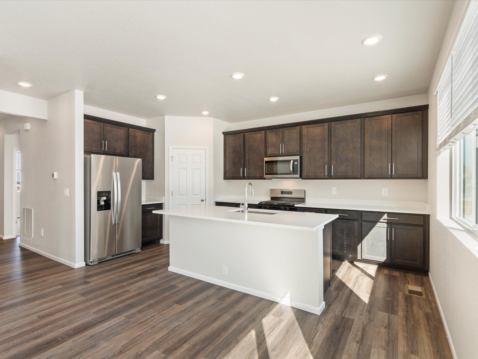 Kitchen:The Monarch Floorplan interior image taken at a Meritage Homes community in Greeley, CO
