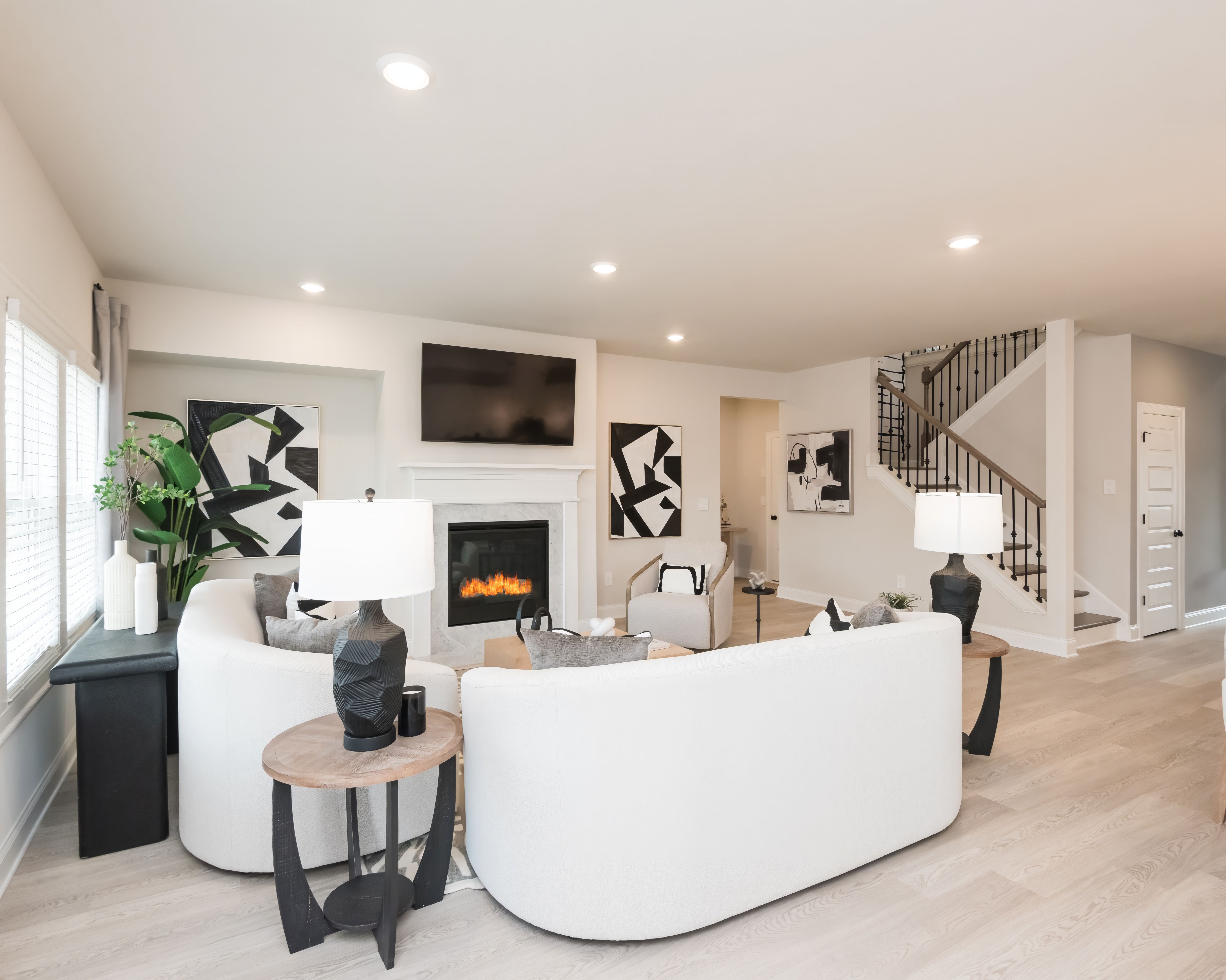 Living Room:The Johnson floorplan with the Lush White interior package modeled at Martin Springs.