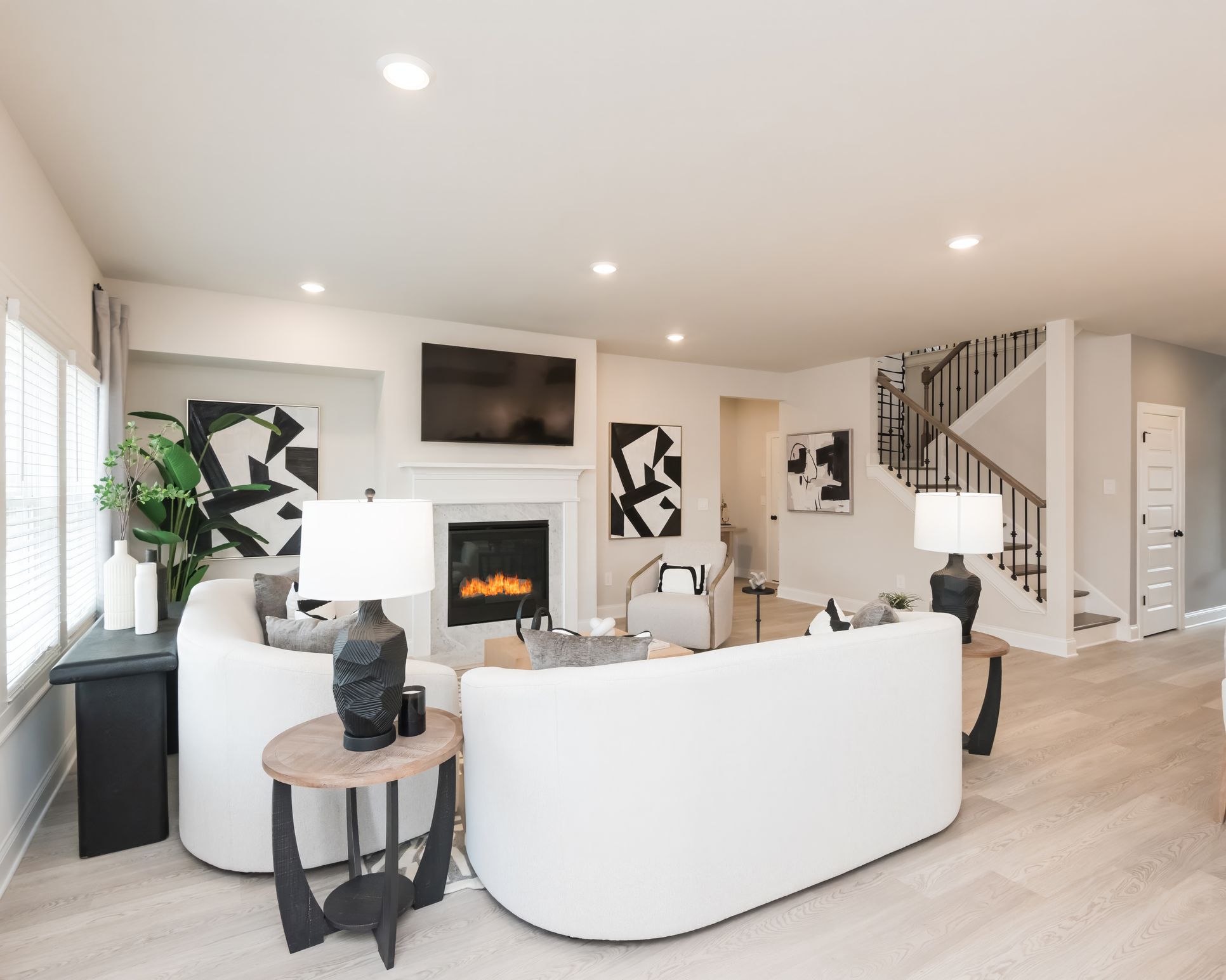 Living Room:The Johnson floorplan with the Lush White interior package modeled at Martin Springs.