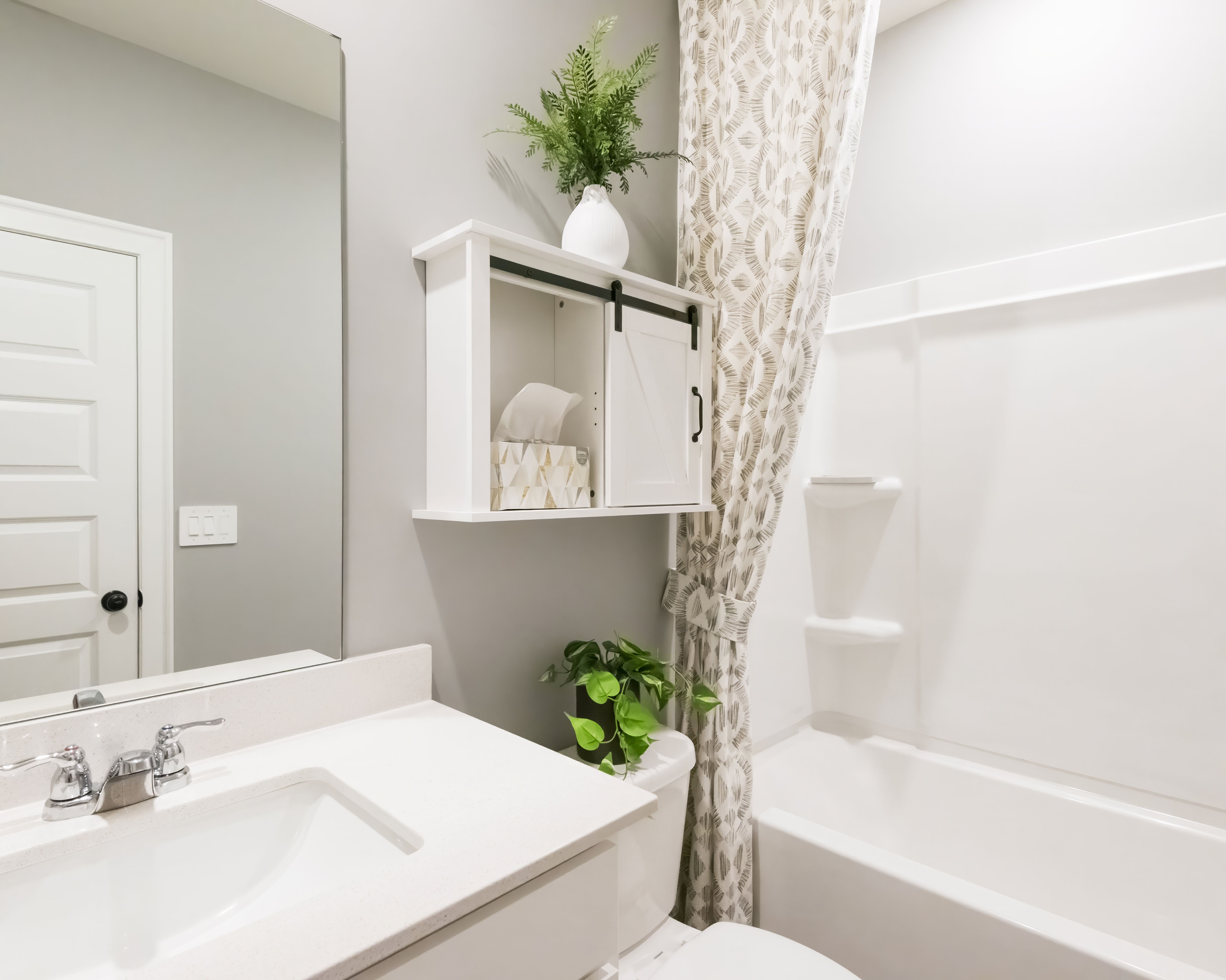 Secondary Bathroom:The Johnson floorplan with the Lush White interior package modeled at Martin Springs.