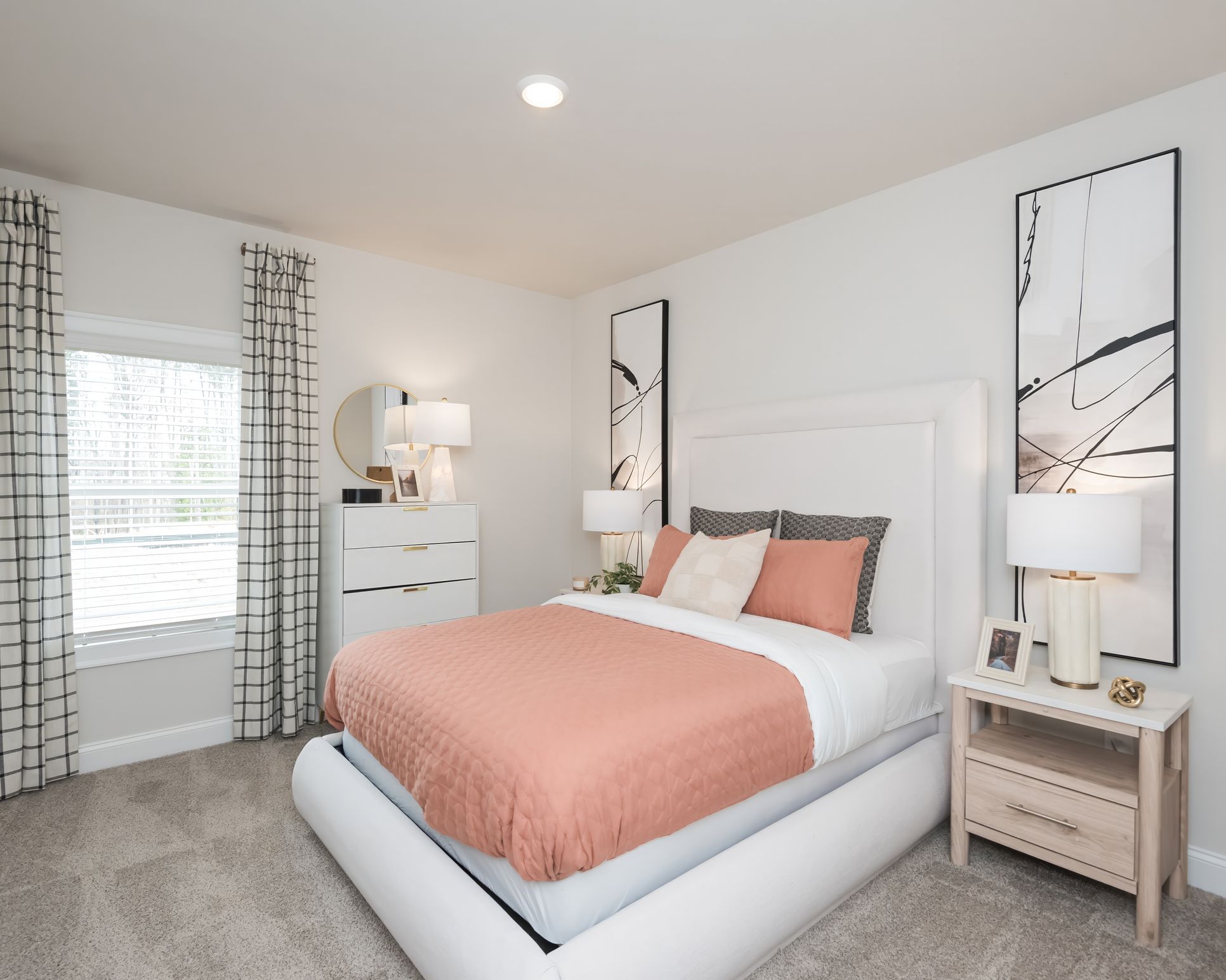 Secondary Bedroom:The Johnson floorplan with the Lush White interior package modeled at Martin Springs.