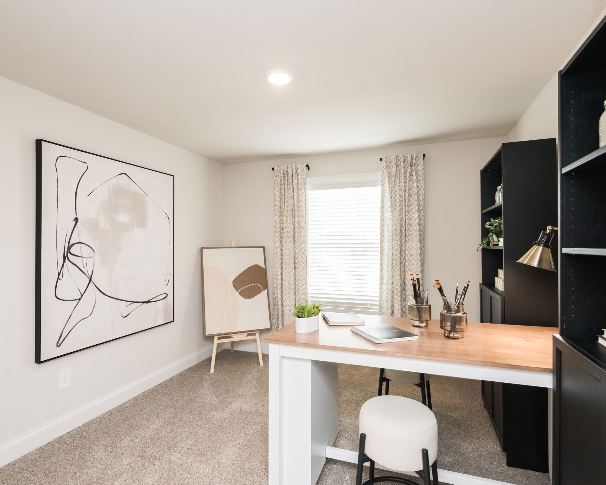 Secondary Bedroom:The Johnson floorplan with the Lush White interior package modeled at Martin Springs.