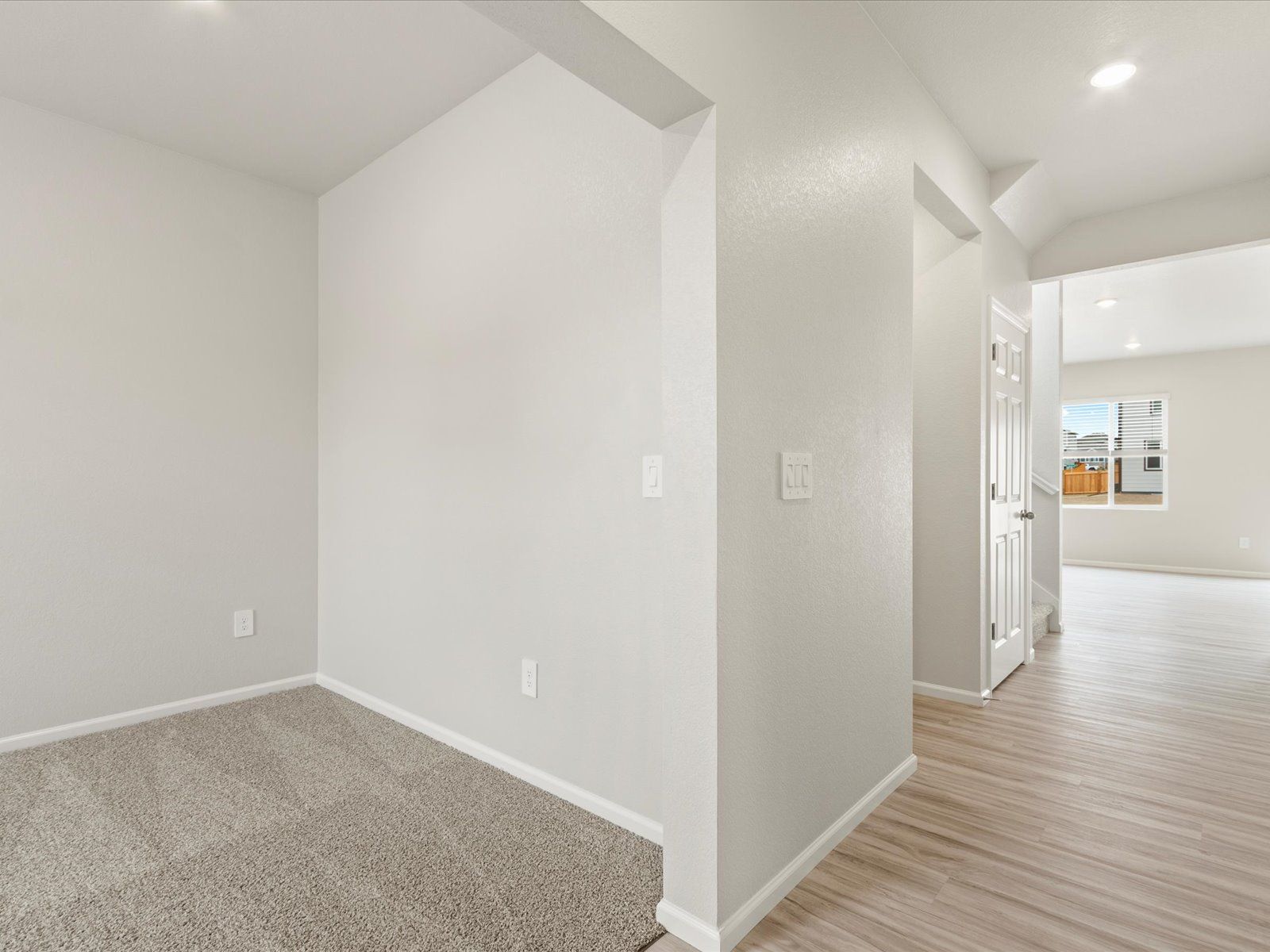 Hallway:The Twin Peaks interior image taken at a Meritage Homes community in Severance, CO.