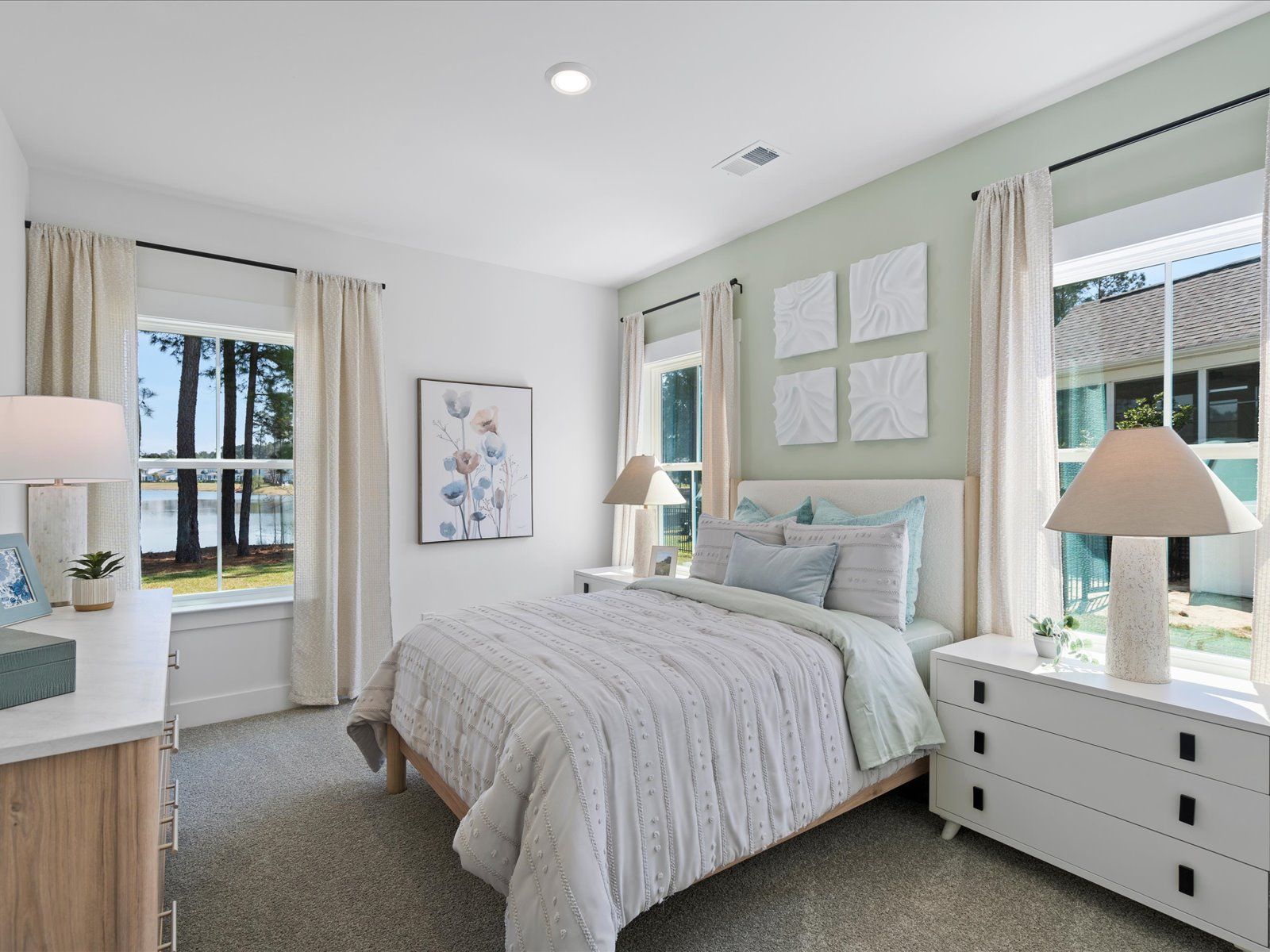 Secondary Bedroom:A private fifth bedroom is located on the first floor next to a full bathroom.