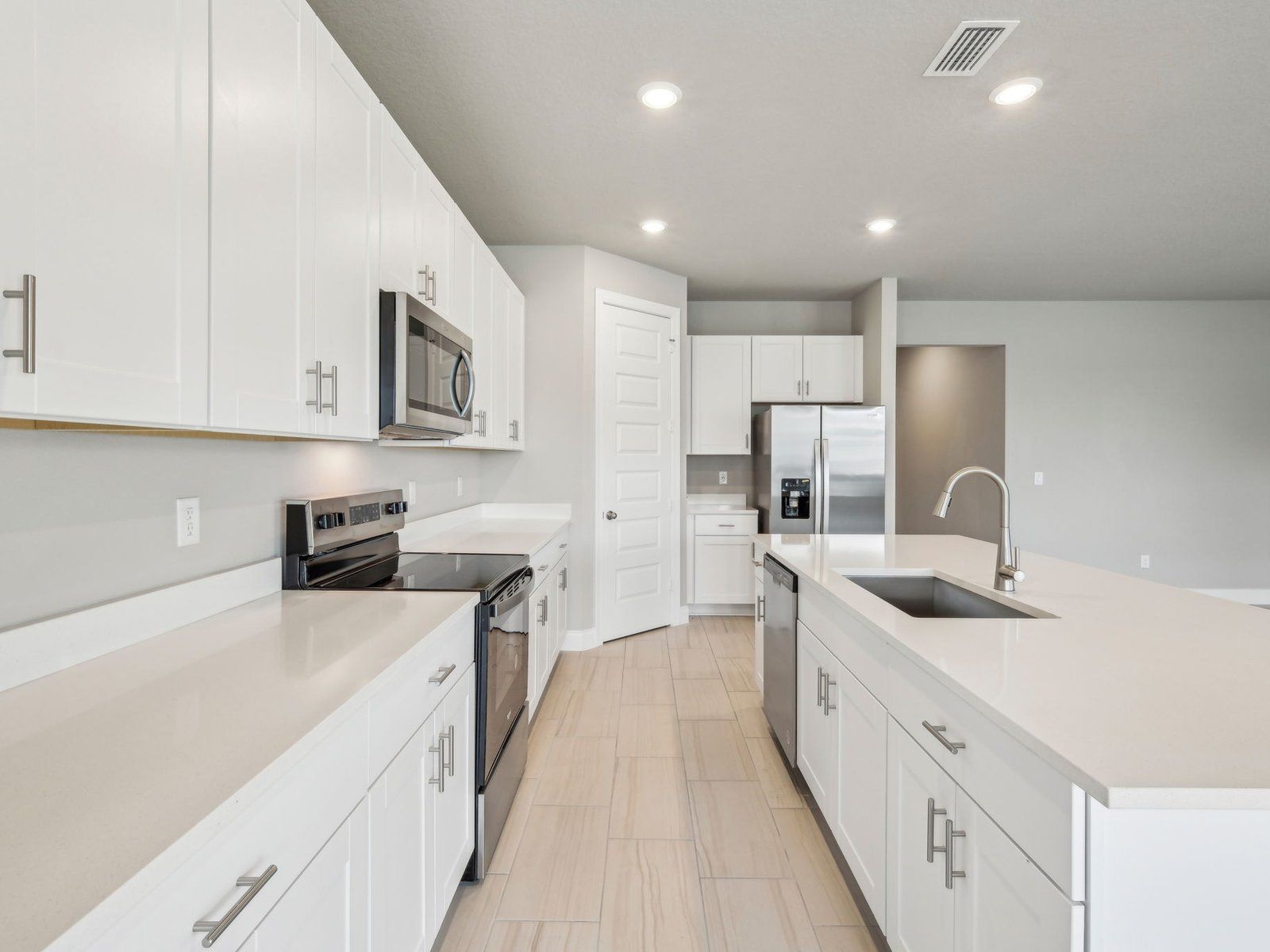 The Emilia Floorplan at 11248 NW Barnstead Way.:Kitchen