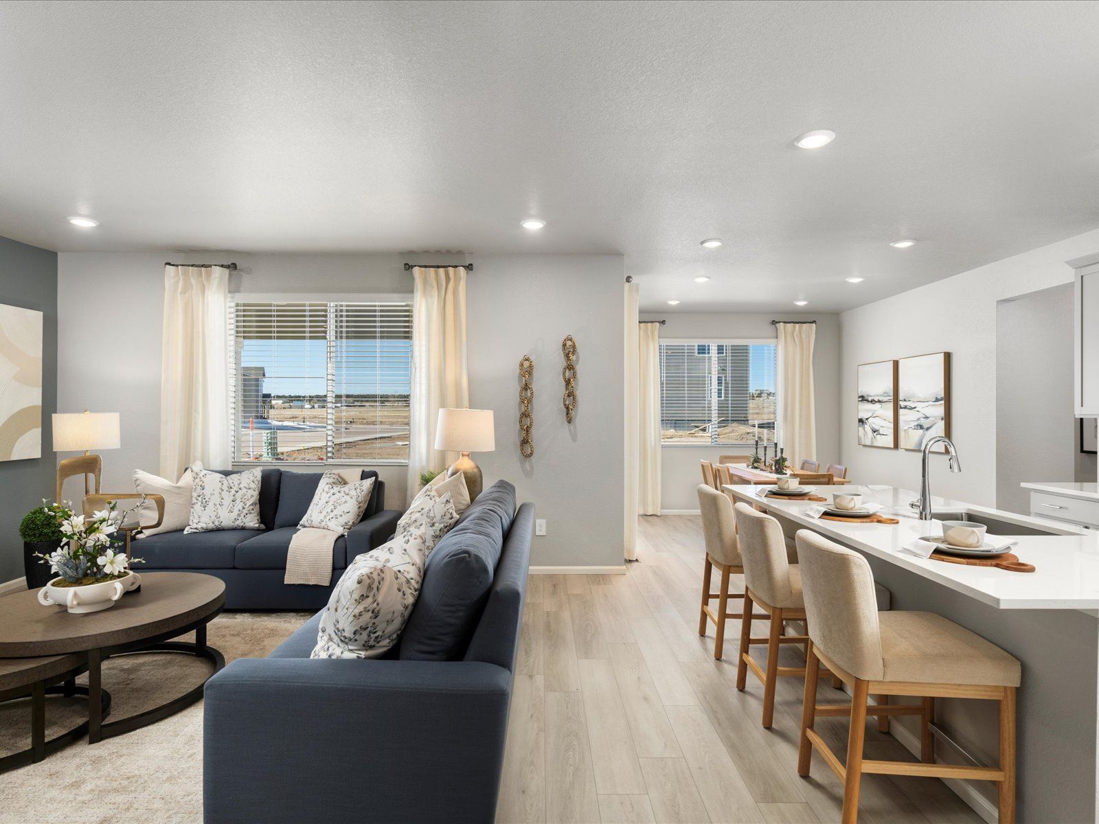 Living/Dining Area:The Granby image modeled at a Meritage Homes community in Falcon, CO