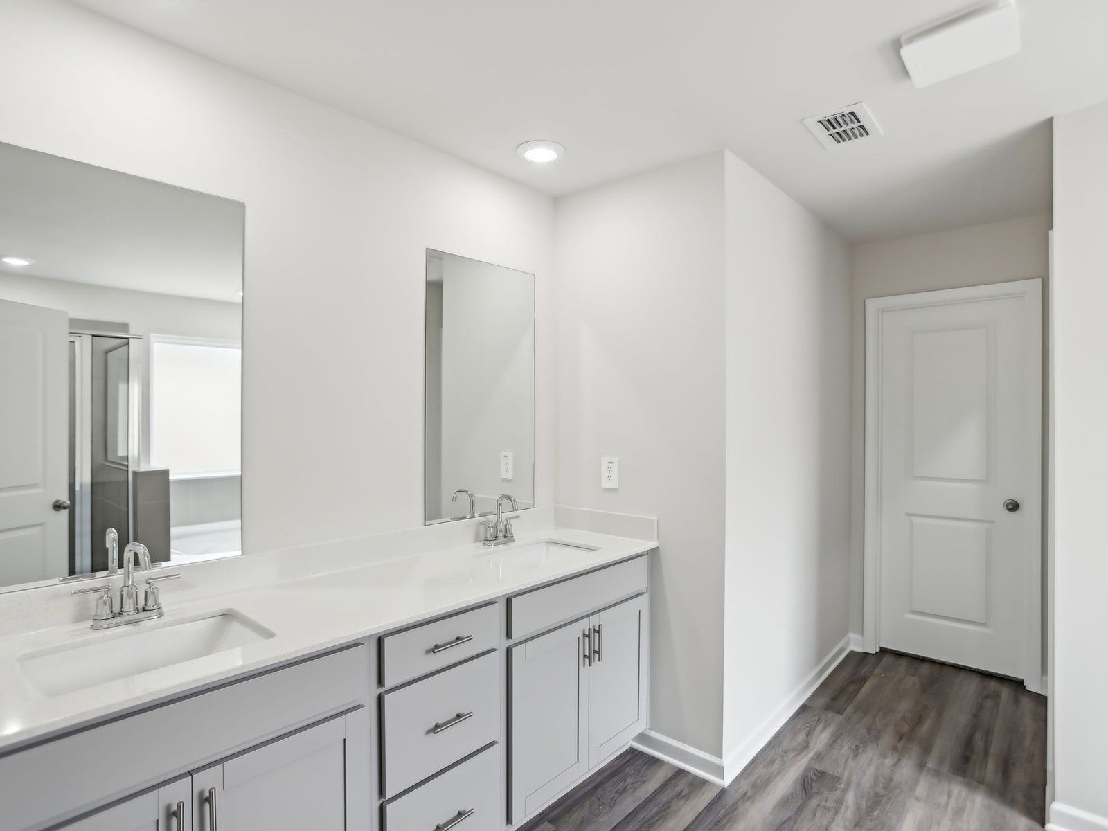 Primary Bathroom:The Dakota floorplan with the Distinct Grey interior package.