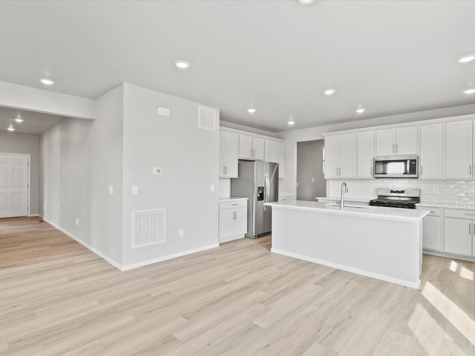 Kitchen:The Chatfield floorplan image taken at a Meritage Homes community in Johnstown, CO