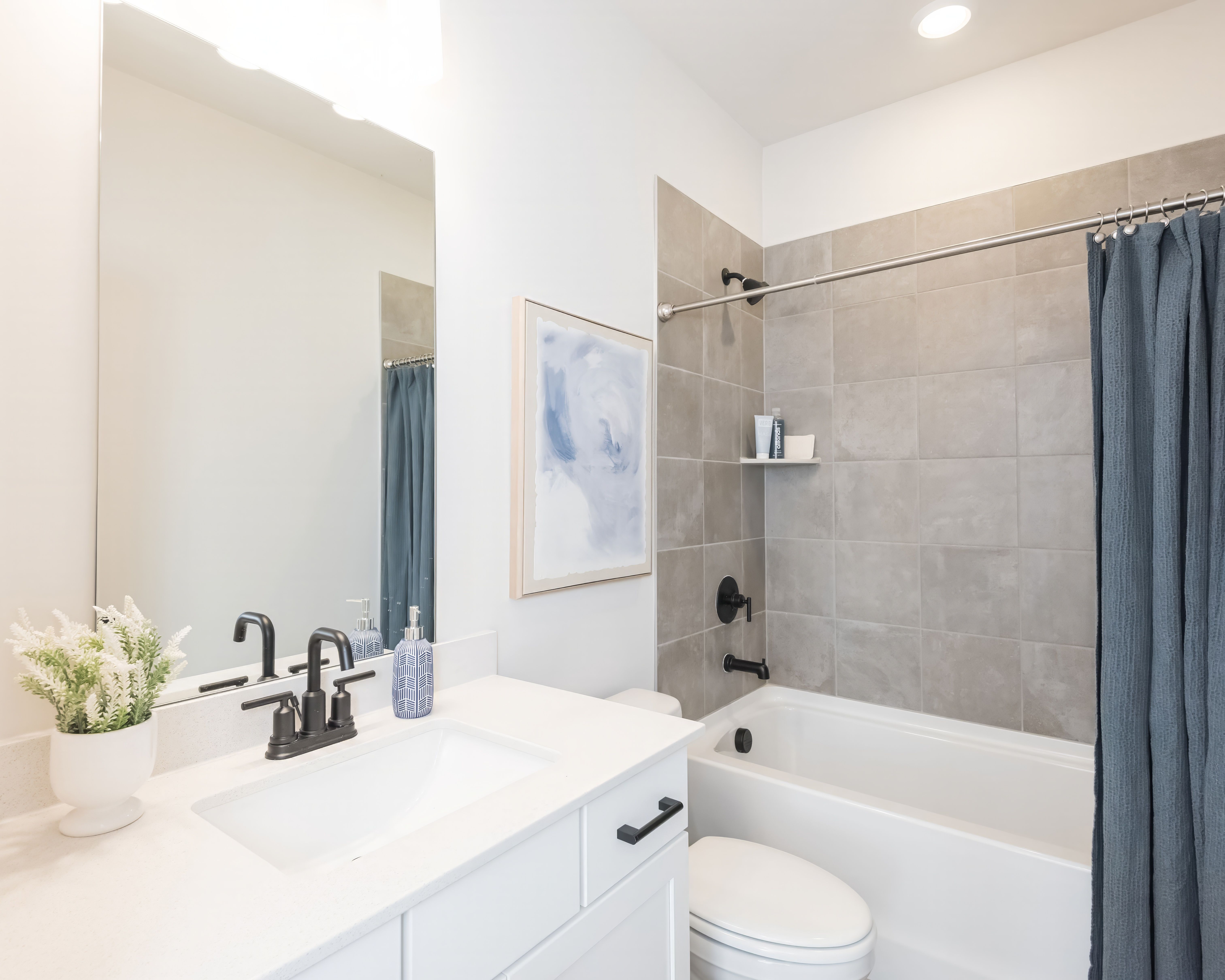 Secondary Bathroom:The Oakley model features a convenient full bath on main.
