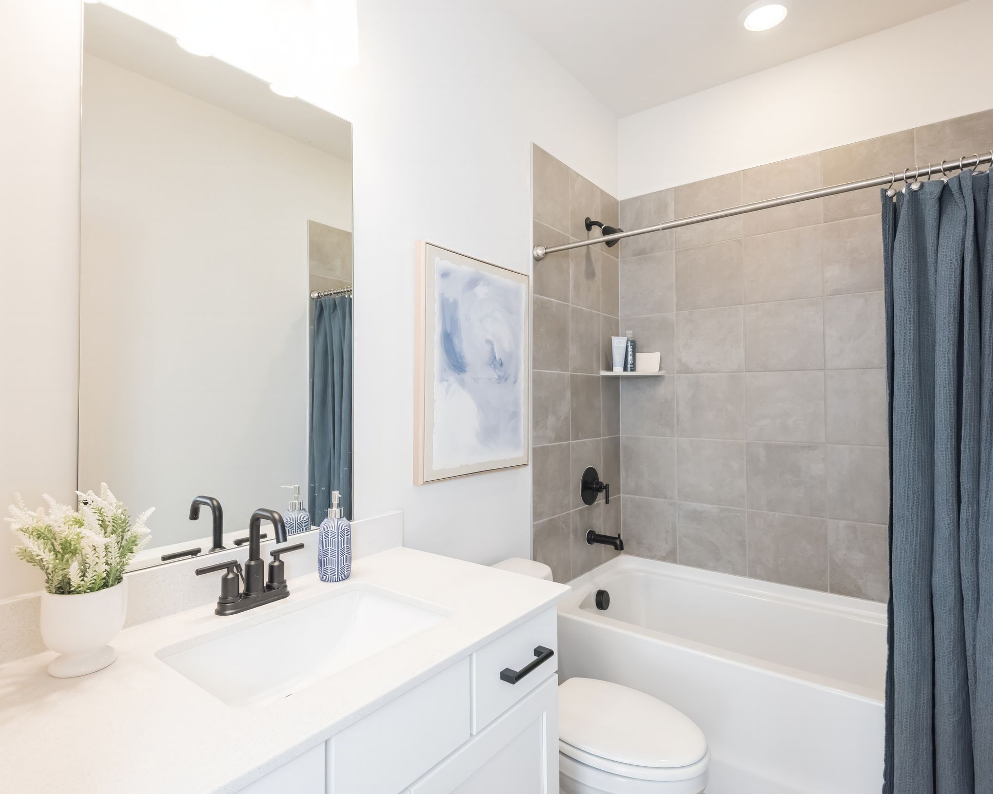 Secondary Bathroom:The Oakley model features a convenient full bath on main.