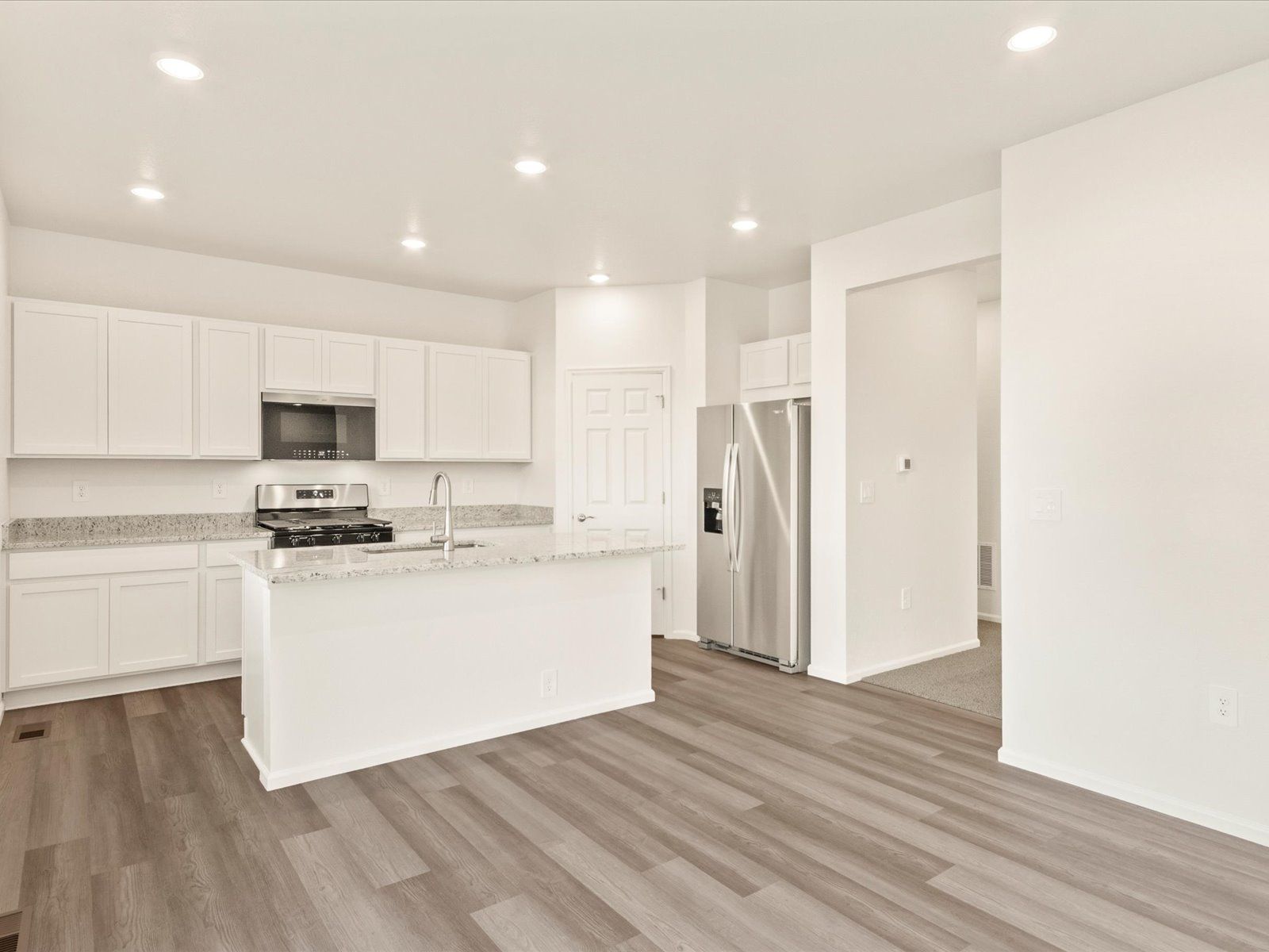 Kitchen:The Pagosa floorplan interior image taken at a Meritage Homes community in Northern Colorado.