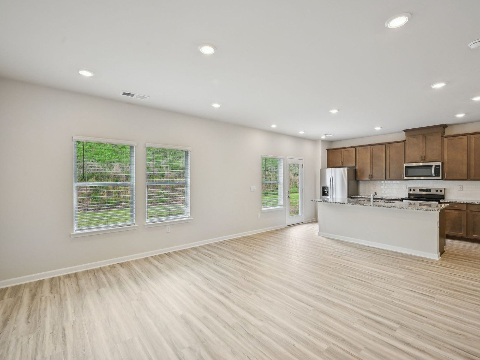 The Finley floorplan with the Calm Latte Interior Package.:Great Room