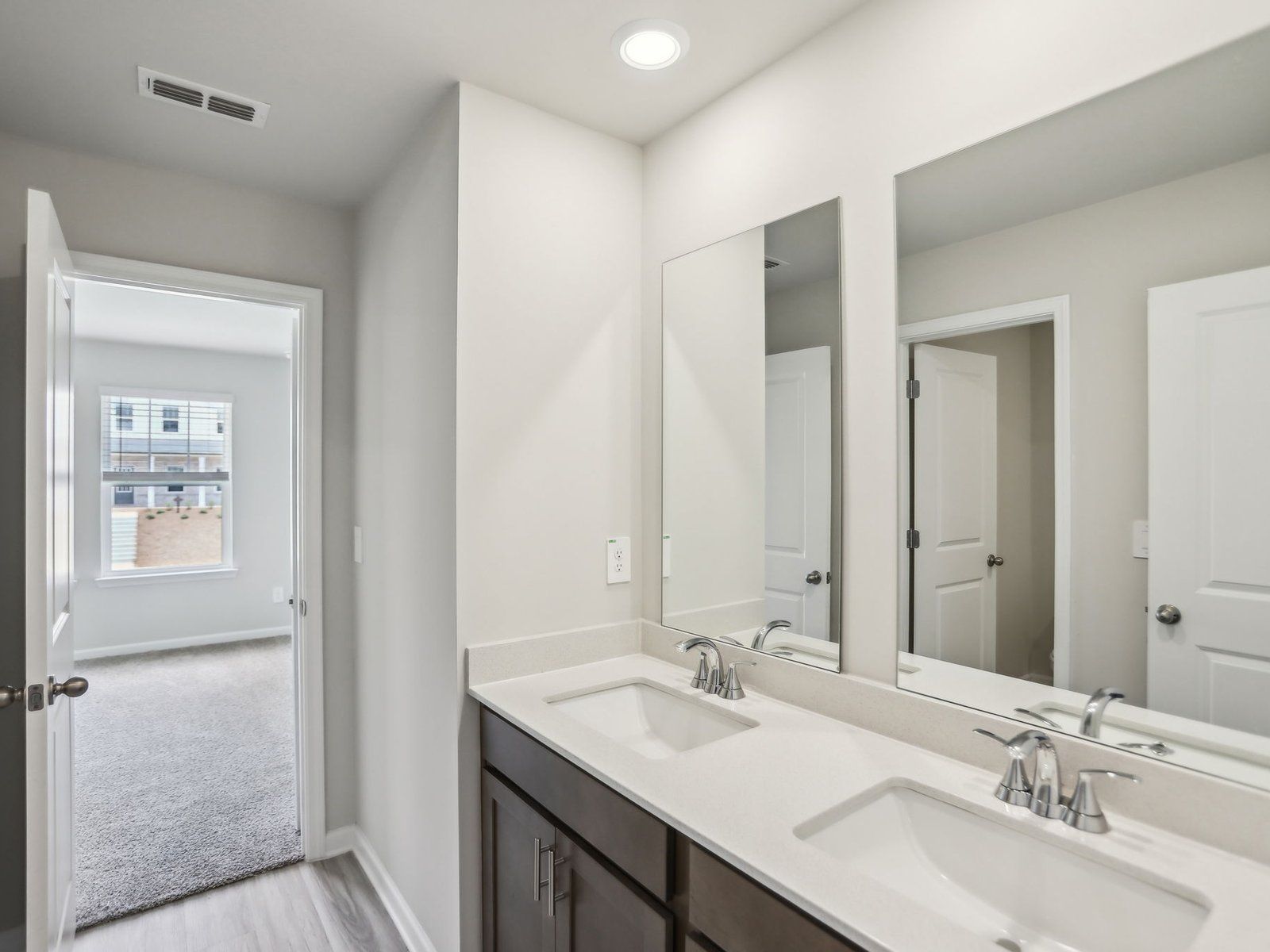 Secondary Bathroom:The Thompson floorplan with the Sleek Grey Interior Package.
