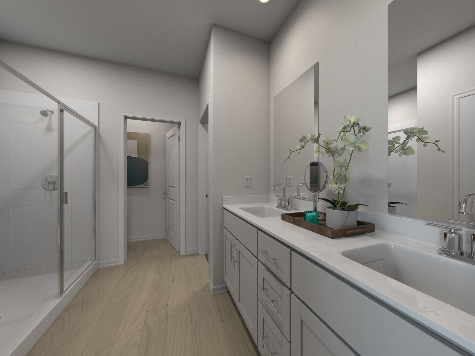 Primary Suite Bathroom:The primary bathroom offers dual vanity sinks and a walk-in closet.