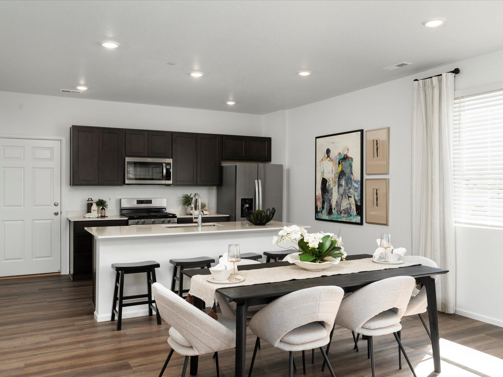 The Woodland floorplan modeled at Poudre Heights in Windsor, CO