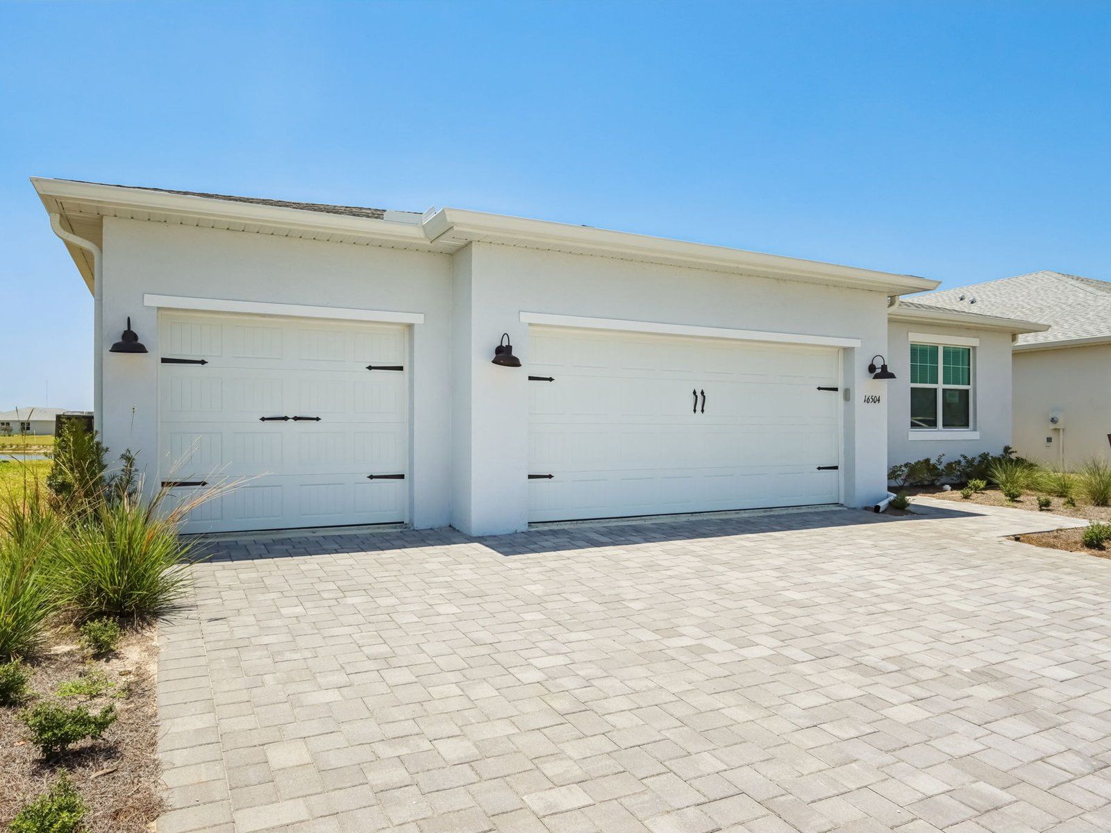 Exterior of the Willet floorplan at 16504 Seven Lakes Avenue.:Front Exterior
