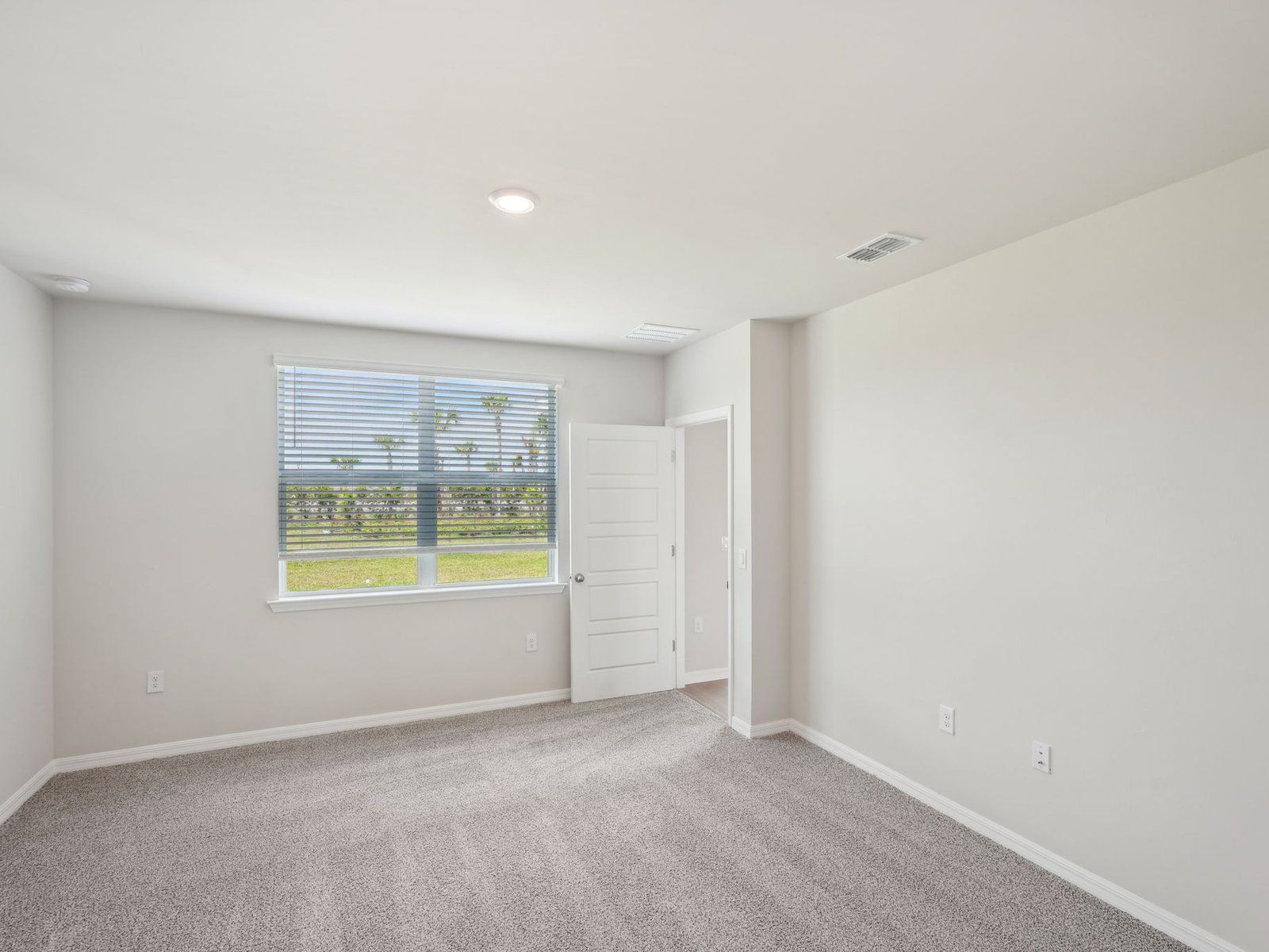 Primary Bedroom:Primary bedroom in the Ibis floorplan at 44427 Diamond Trail.