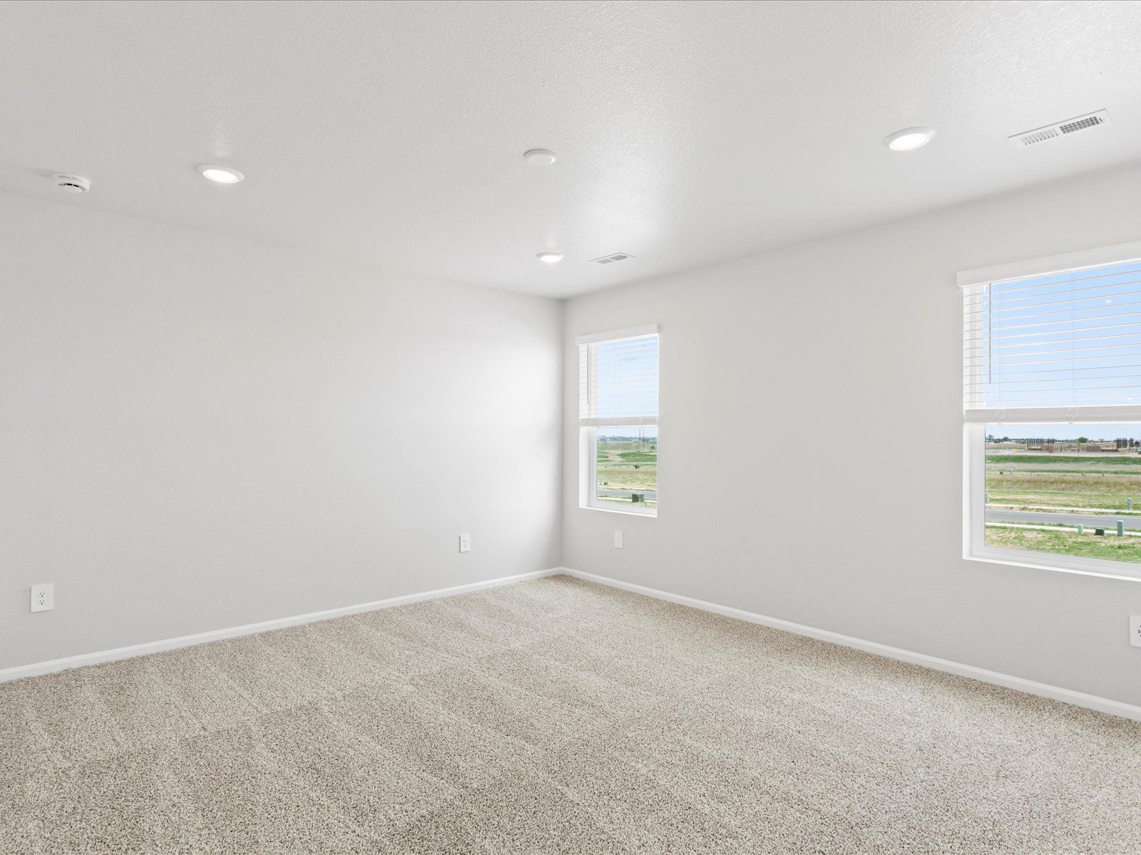 The Cottonwood floorplan modeled at a Meritage Homes community in Greeley, CO.:Bedroom