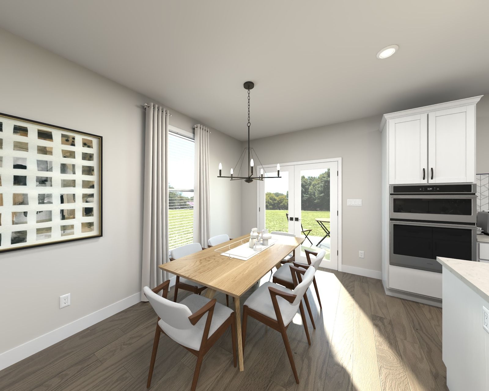 The open-concept floorplan allows for an easy flow between the kitchen and dining areas.:Dining Room