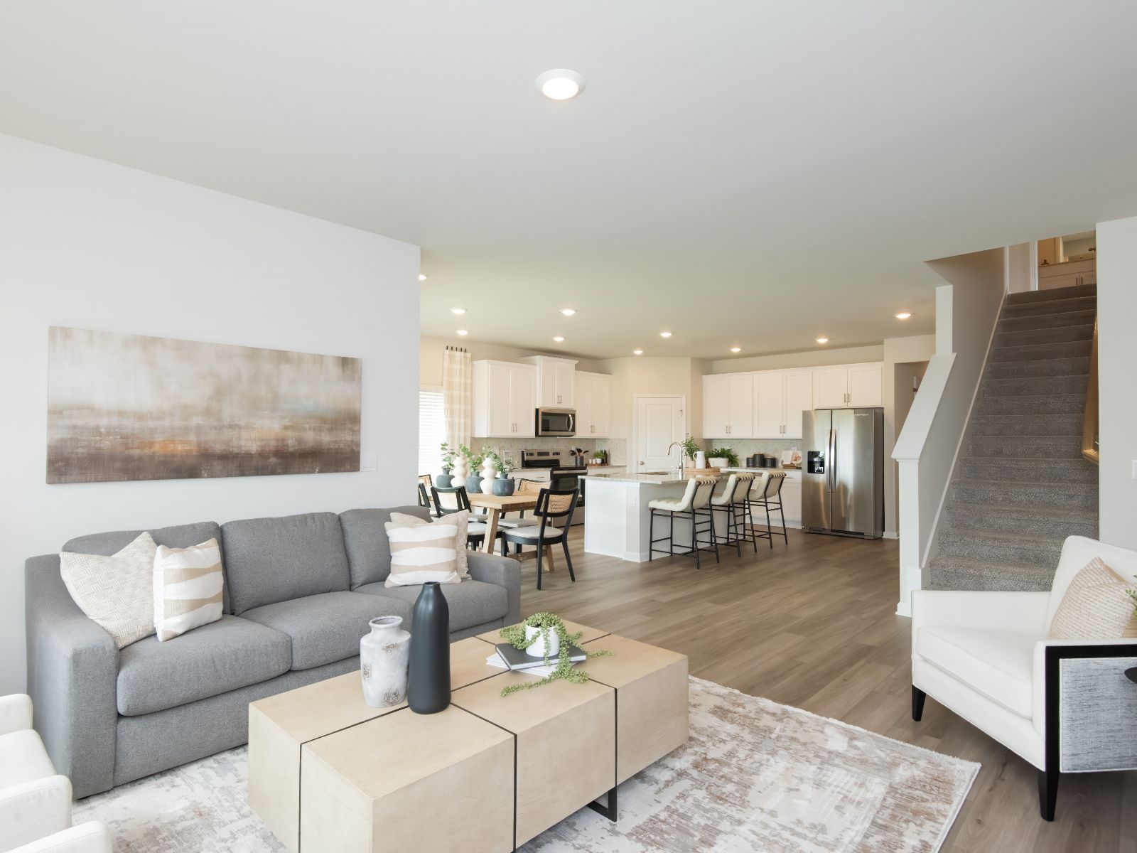 Great Room:The Northbrook floorplan with the Elemental White interior package modeled at Kendall Farms.