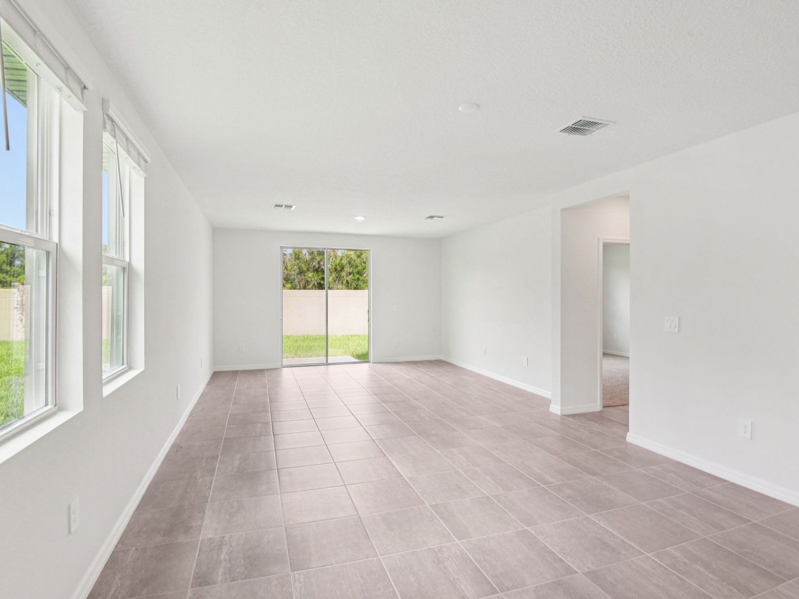 The Acadia Floorplan Great Room at 1847 Brekey Way.:Great Room