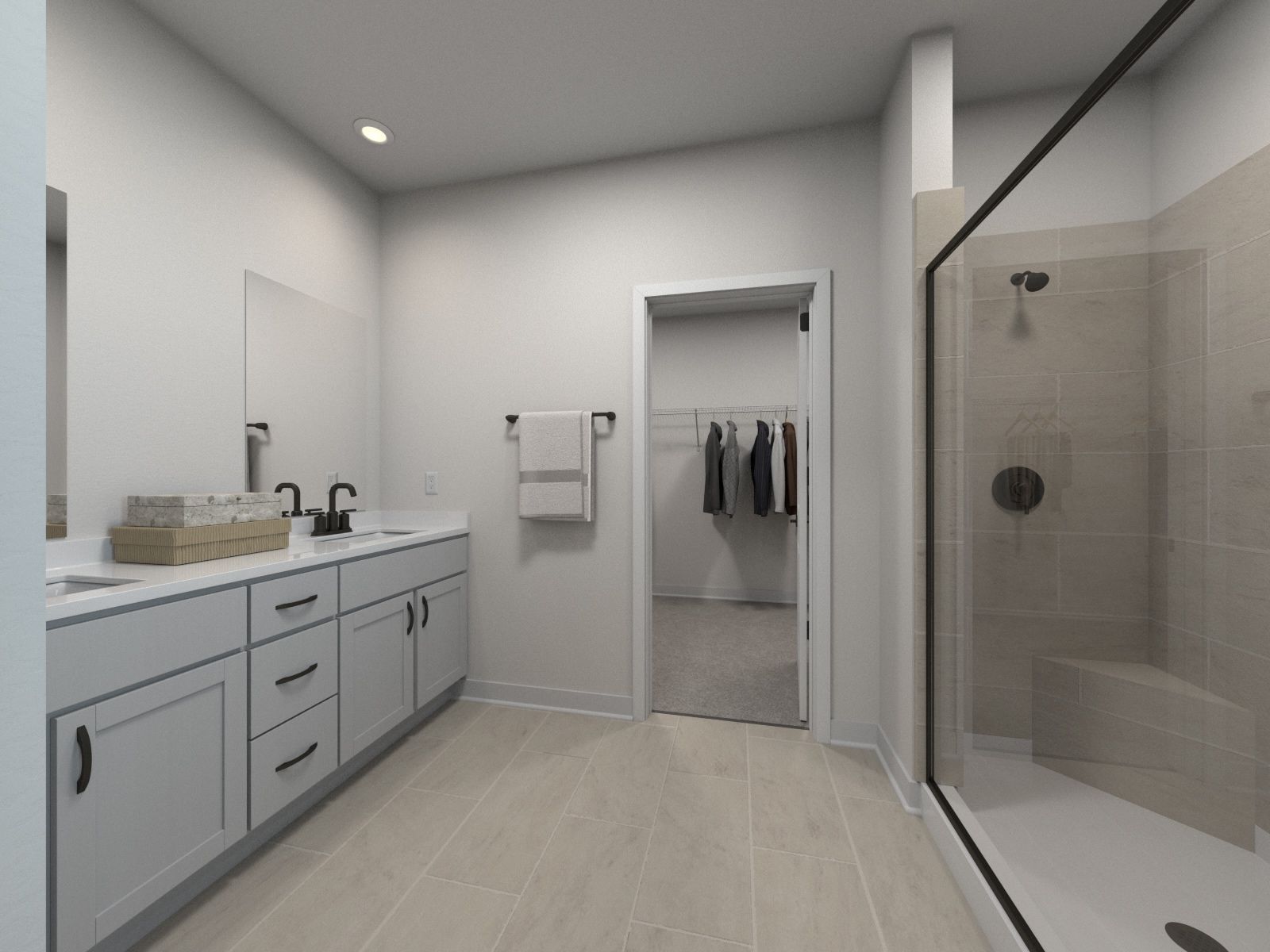 The primary bathroom offers dual vanity sinks and a walk-in shower.:Primary Bathroom
