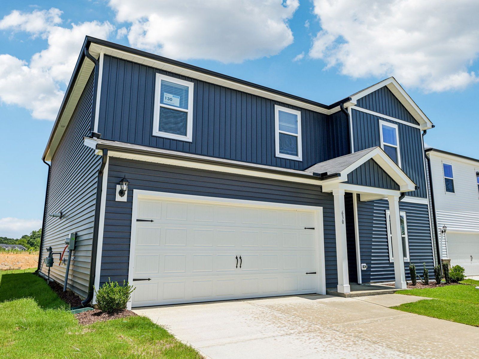 Chatham front exterior at a Meritage Homes community in Angier, NC.:Front Exterior