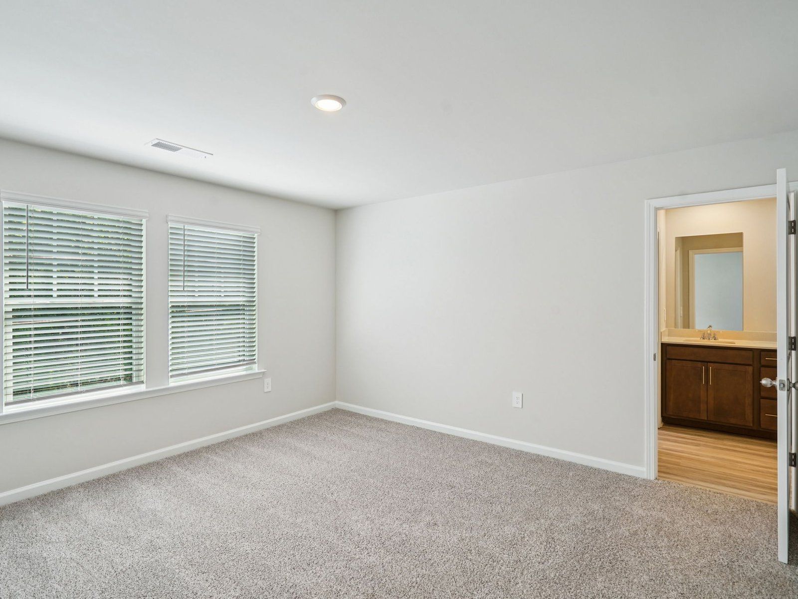 The Truman floorplan with the Calm Burlap interior package.:Primary Bedroom