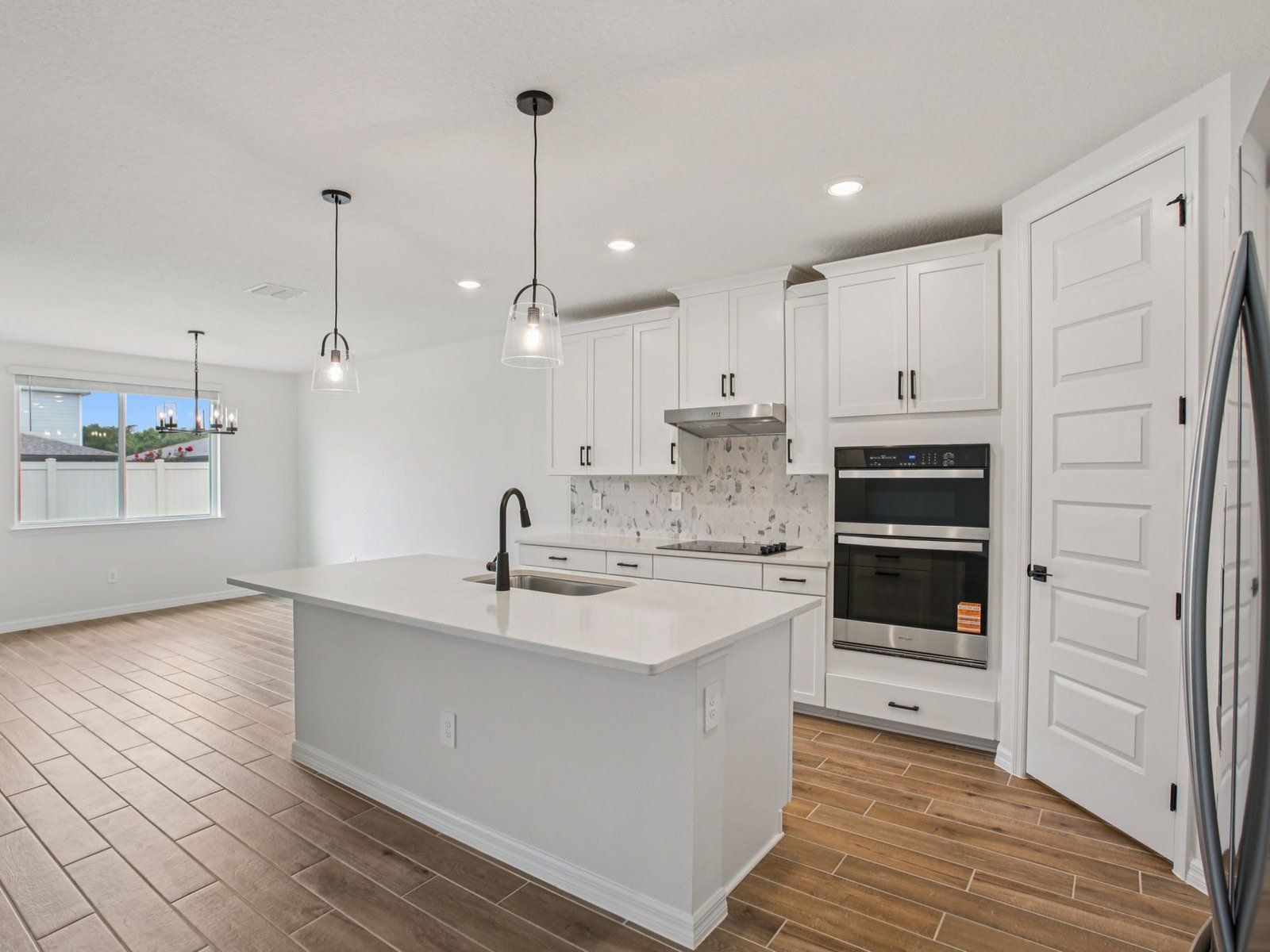 The Paloma Floorplan Kitchen at 1763 Draughton Drive.:16-custom-Tampa - Two Rivers - 1763 Drauhgton Drive Zephyrhills FL 33541-016.jpg