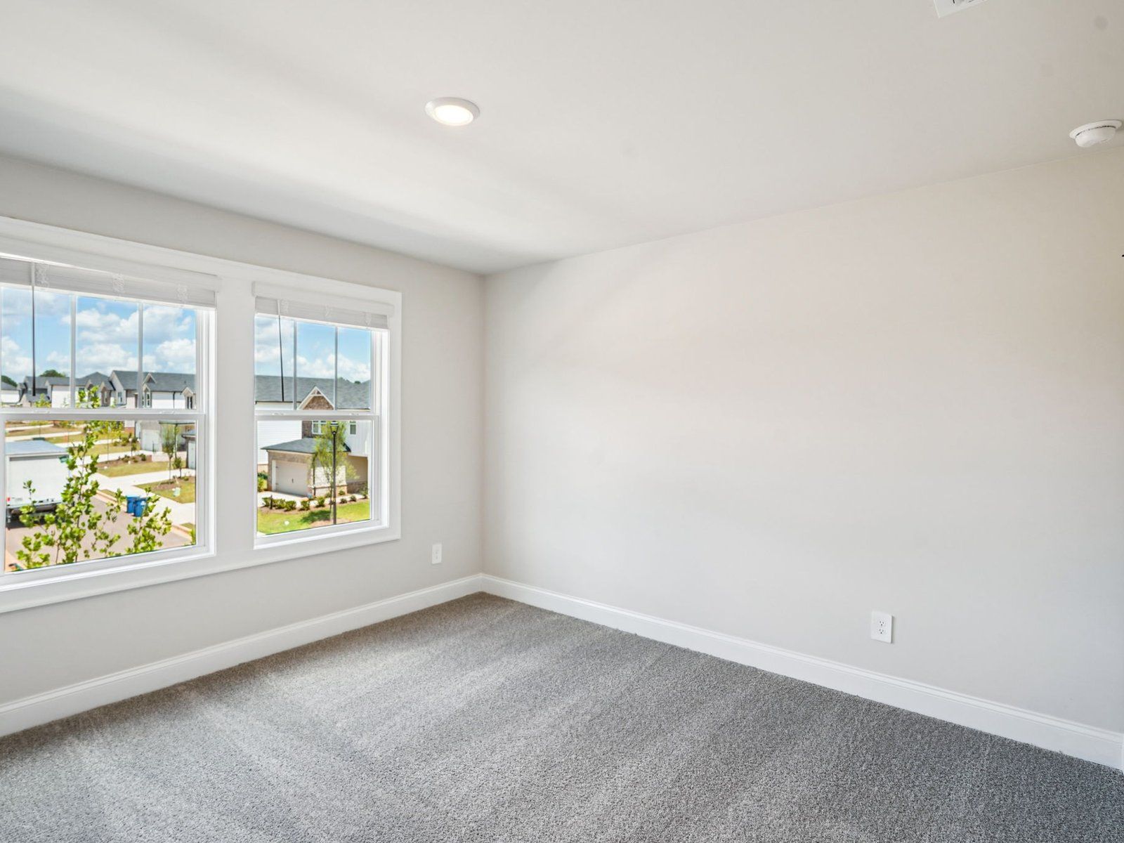 Secondary Bedroom:The Taylorsville Basement floorplan with the Distinct Gray interior package.