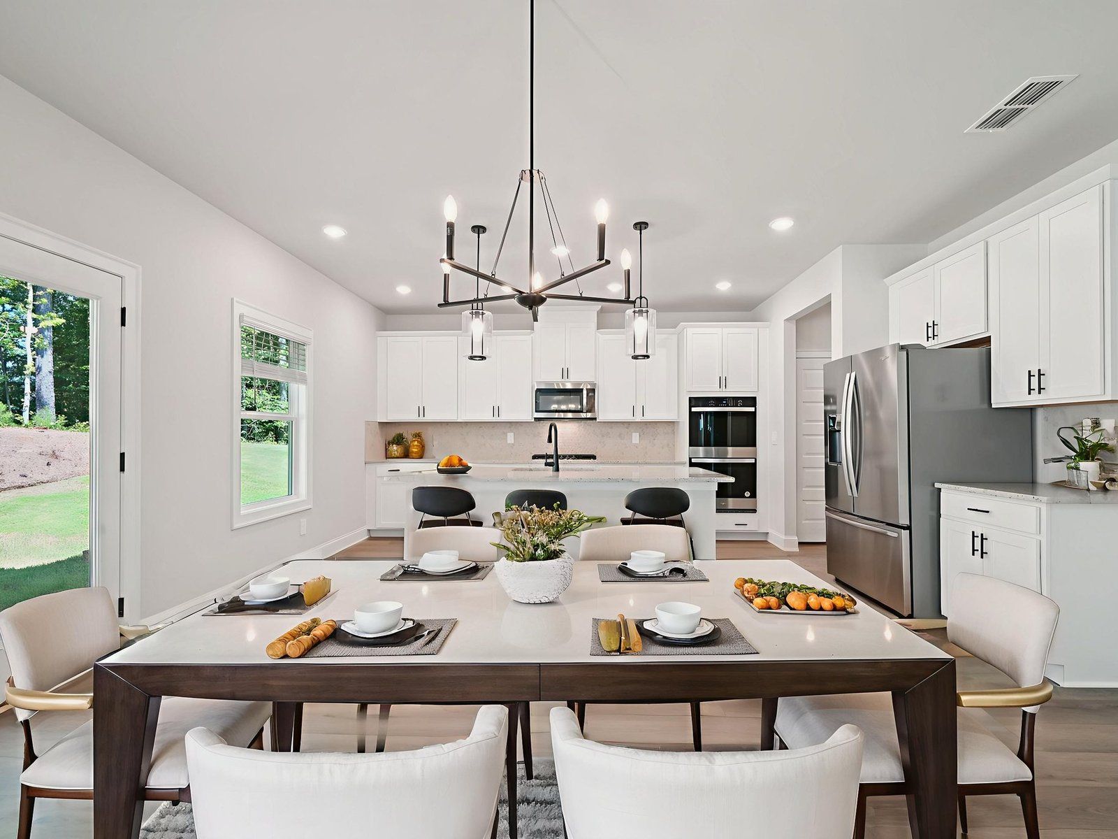 The Taylorsville floorplan with the Elemental White interior package.:Dining Room