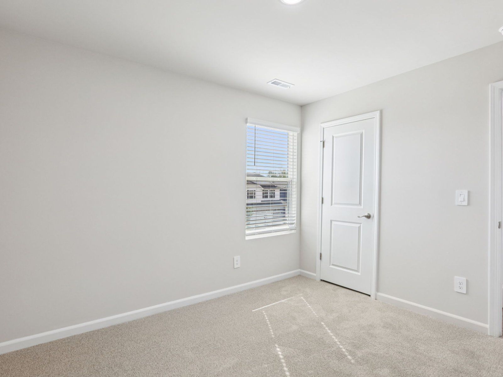 Secondary bedroom in the Lennon floorplan at a Meritage Homes community in Garner, NC.:Secondary Bedroom