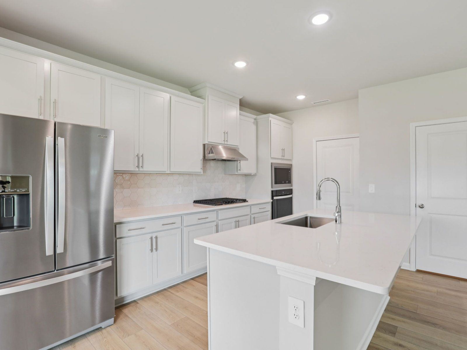 Kitchen in the Dallas floorplan at a Meritage Homes community in Garner, NC.:Kitchen